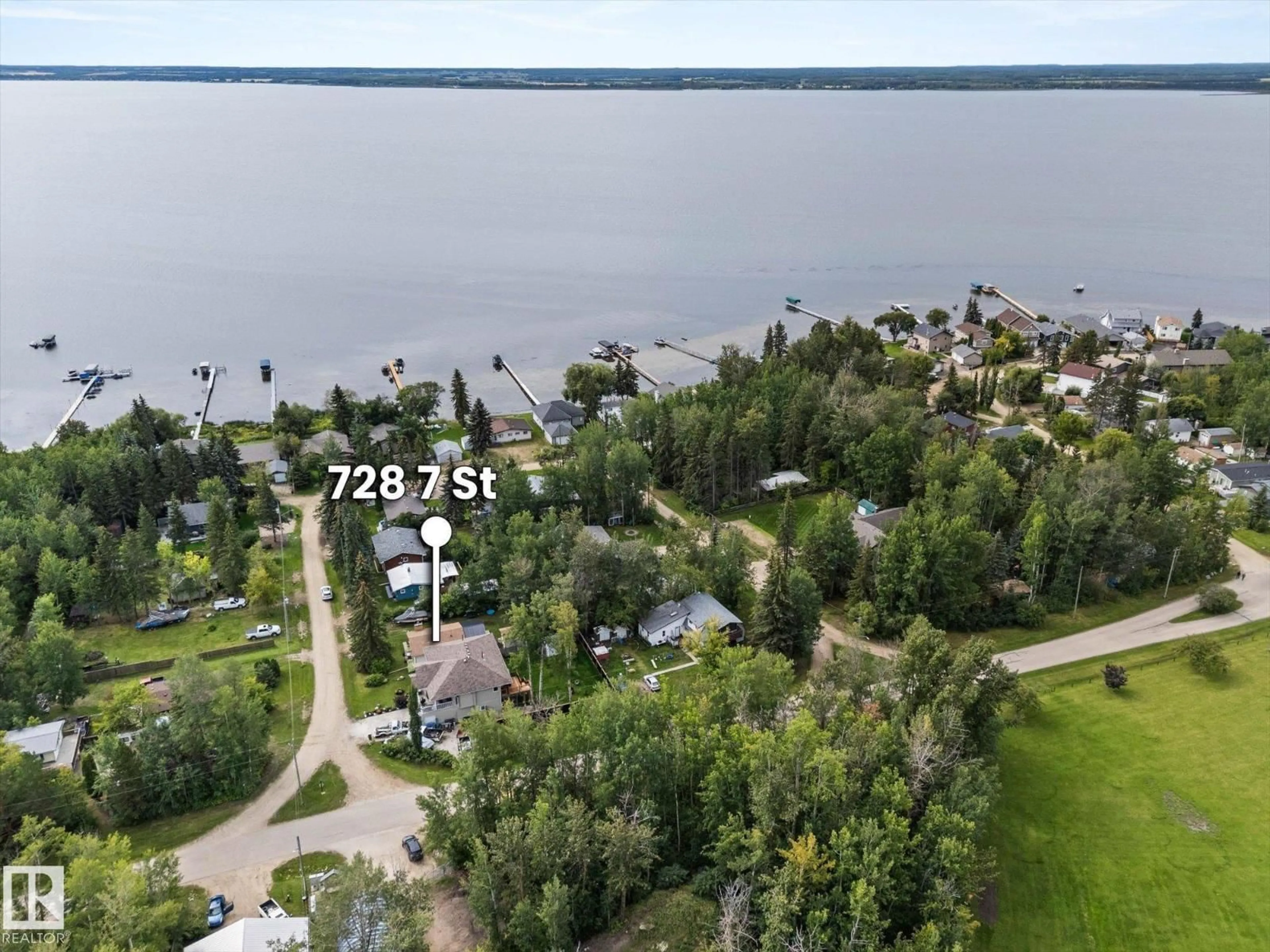 A pic from outside/outdoor area/front of a property/back of a property/a pic from drone, water/lake/river/ocean view for 728 7 STREET, Rural Lac Ste. Anne County Alberta T0E1A0