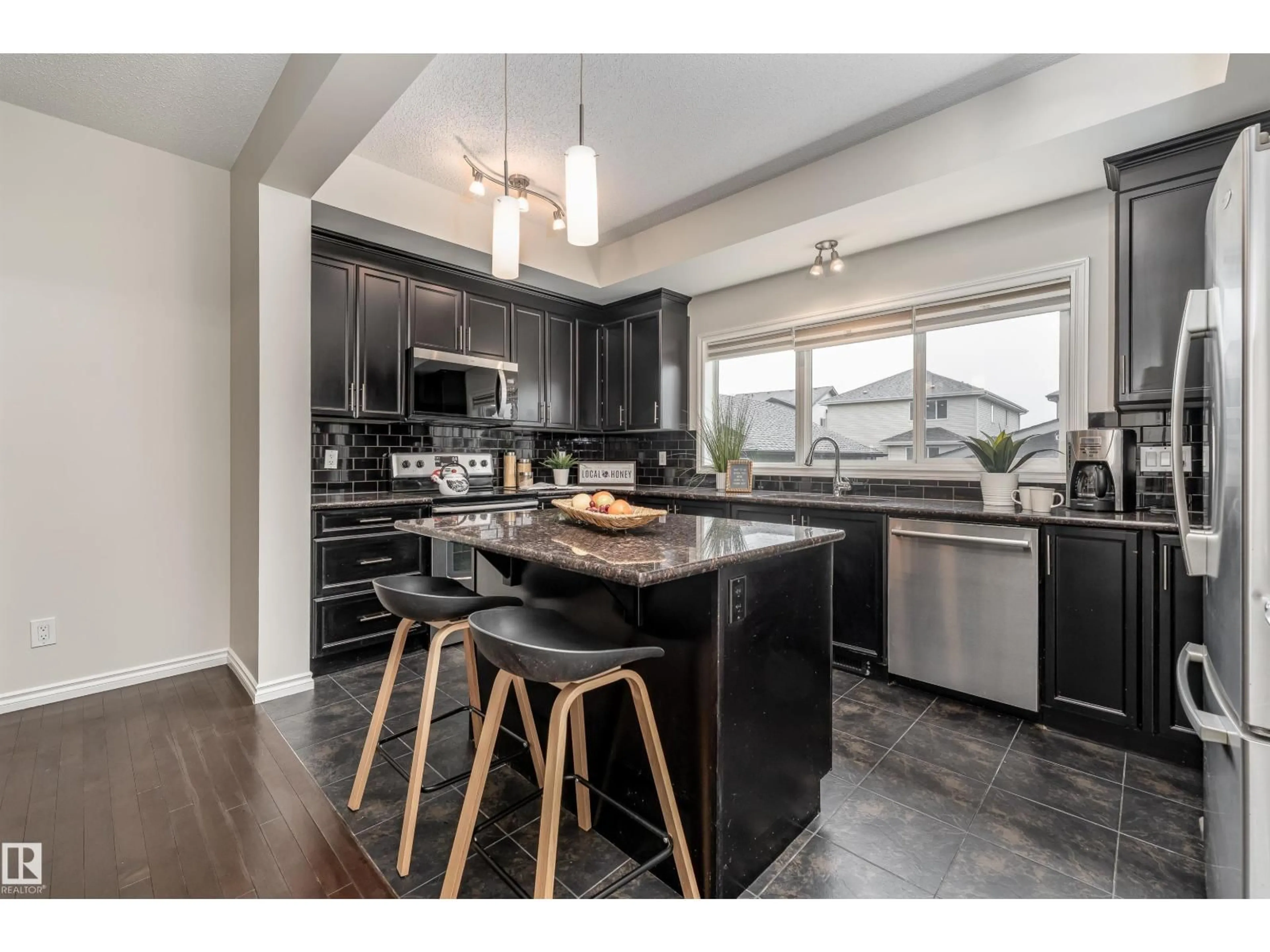 Open concept kitchen, unknown for 1075 MCCONACHIE BV, Edmonton Alberta T5Y0P7