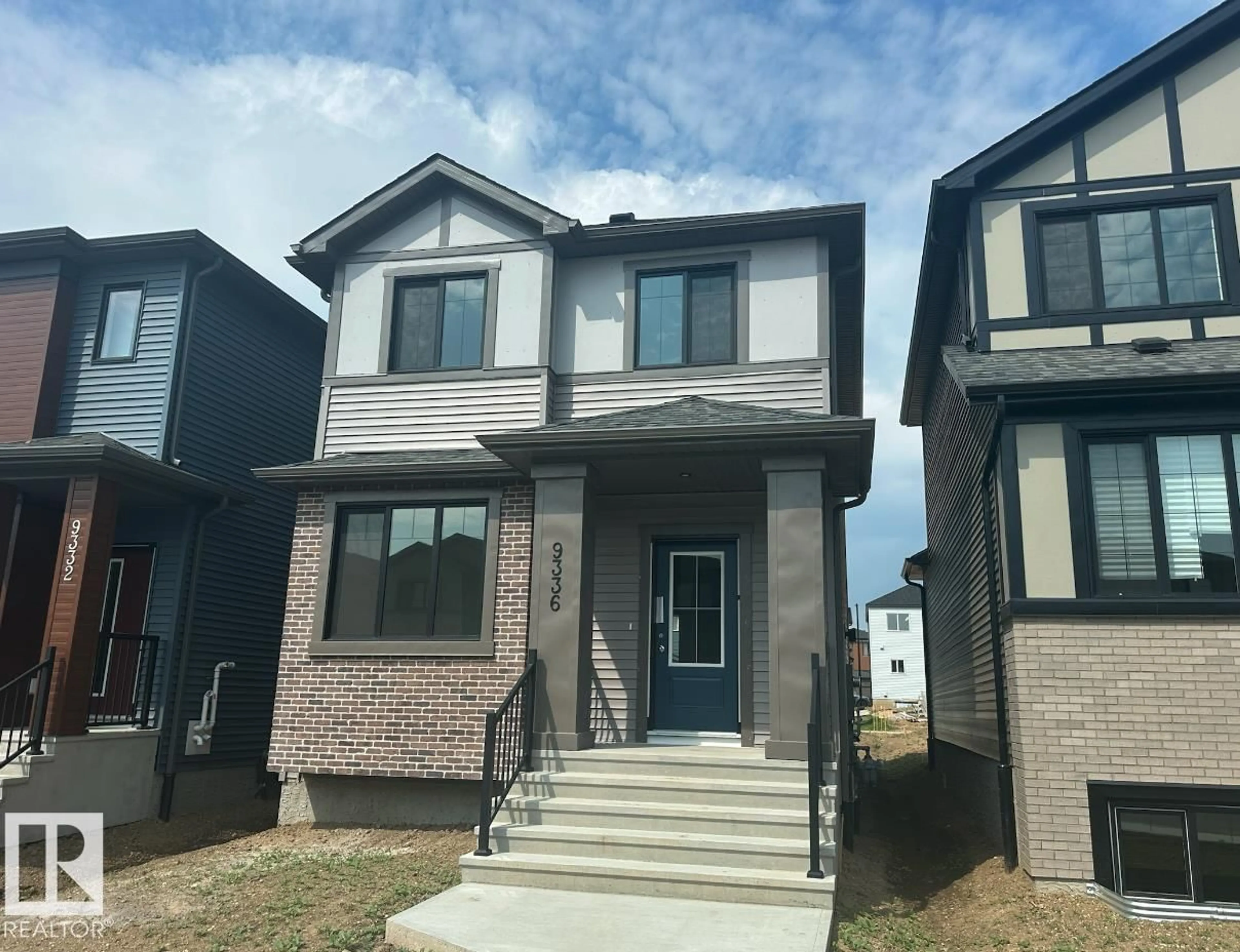 Home with brick exterior material, street for 9336 221 ST, Edmonton Alberta T5T6C9
