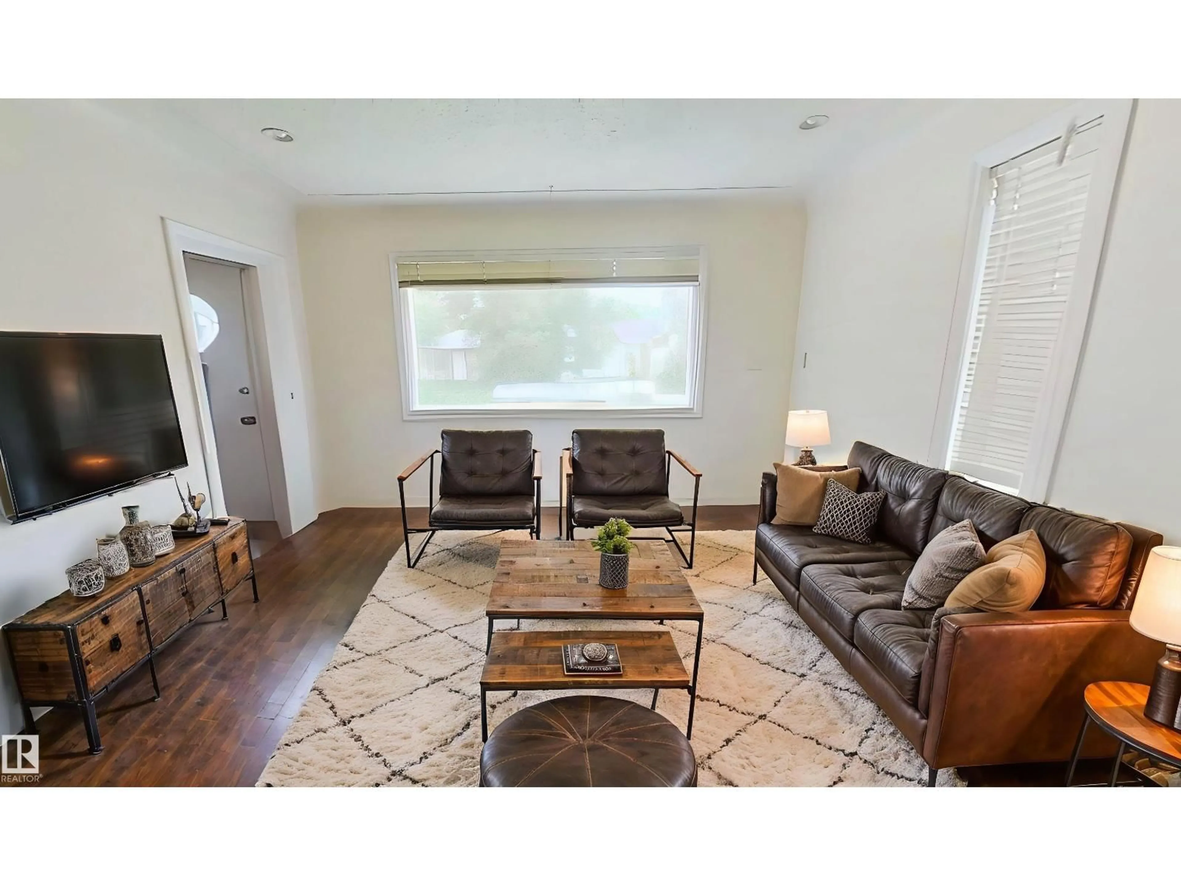 Living room with furniture, unknown for 10627 76 AV, Edmonton Alberta T6E1K8