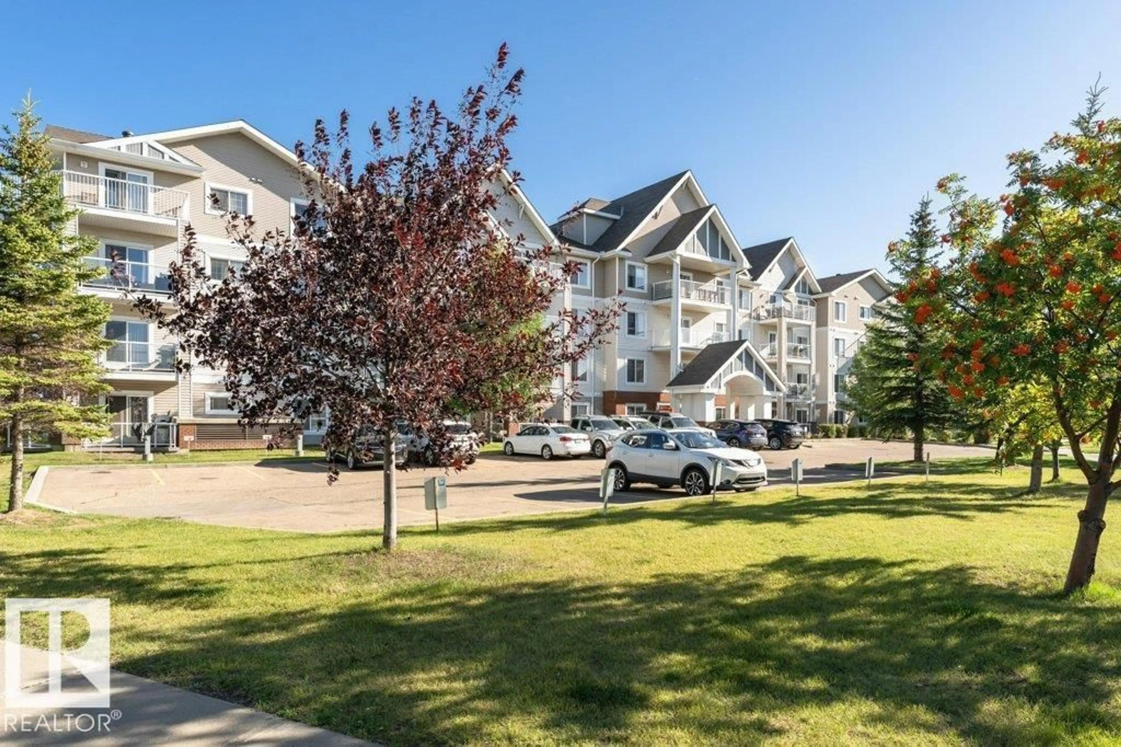 A pic from outside/outdoor area/front of a property/back of a property/a pic from drone, mountain view for #402 - 13830 150 AV NW, Edmonton Alberta T6V1X2