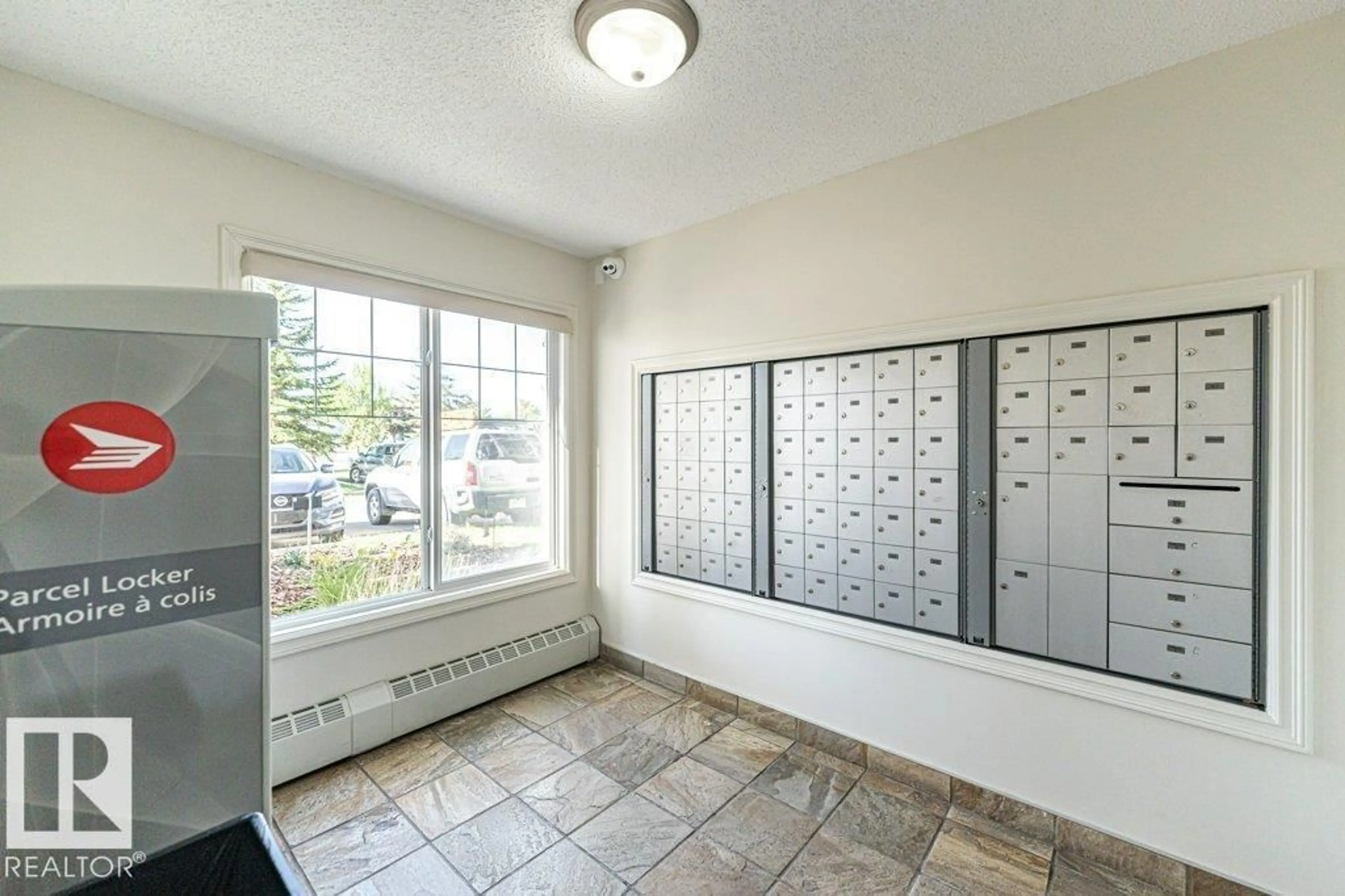 Indoor entryway for #402 - 13830 150 AV NW, Edmonton Alberta T6V1X2