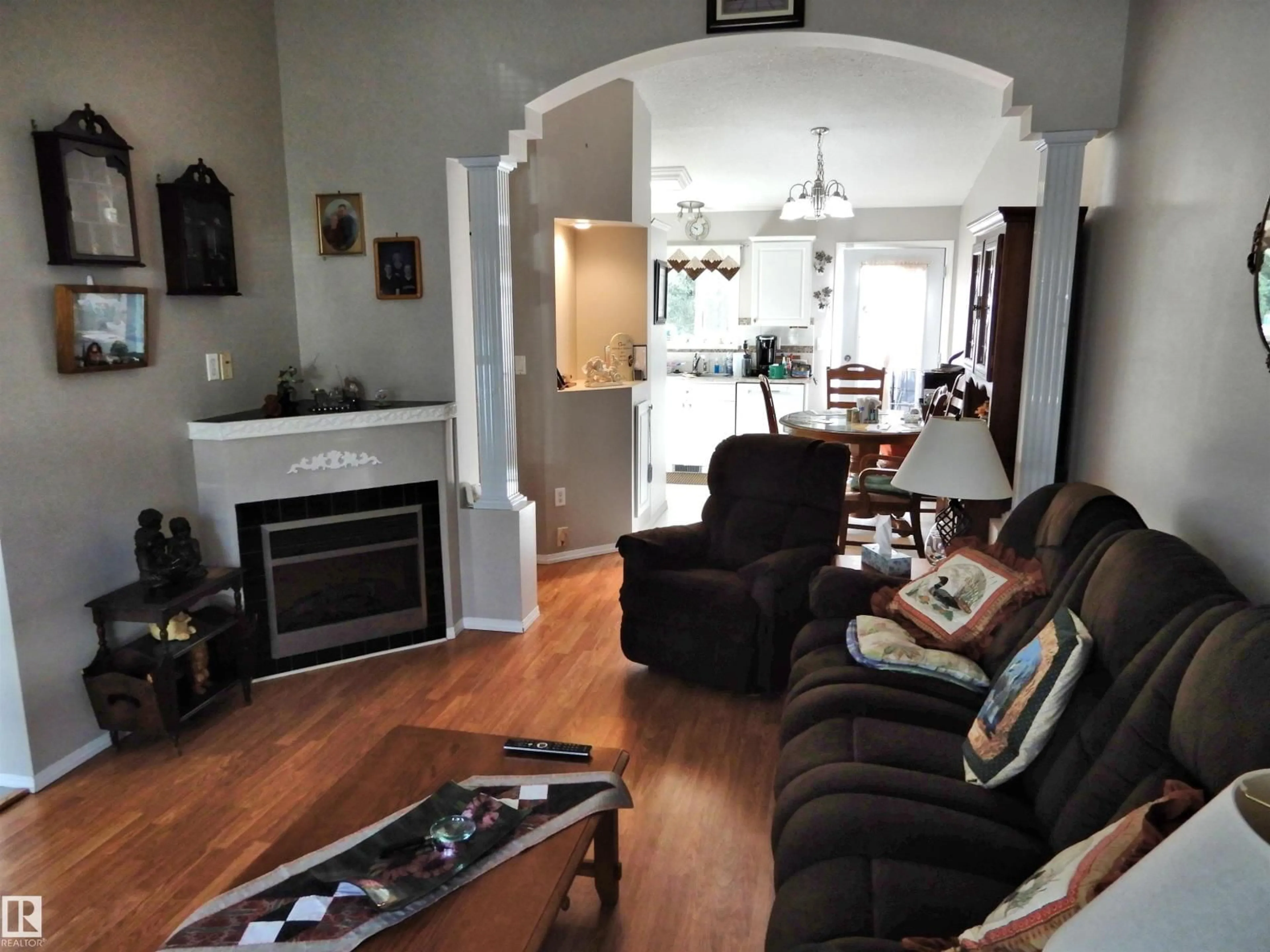 Living room with furniture, unknown for 10111 105 ST, Morinville Alberta T8R1V8