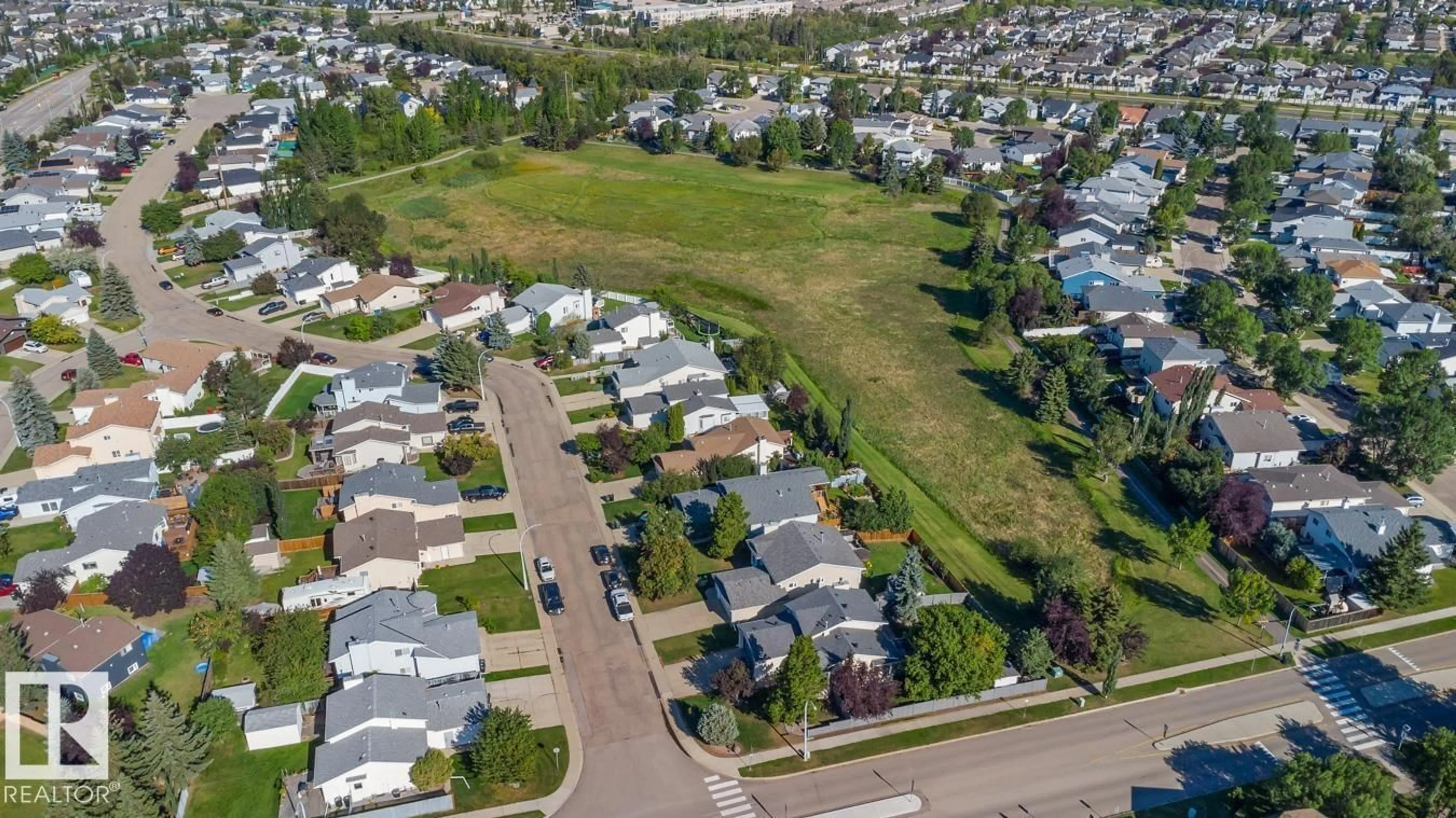 A pic from outside/outdoor area/front of a property/back of a property/a pic from drone, street for 162 DARLINGTON DR, Sherwood Park Alberta T8H1N7