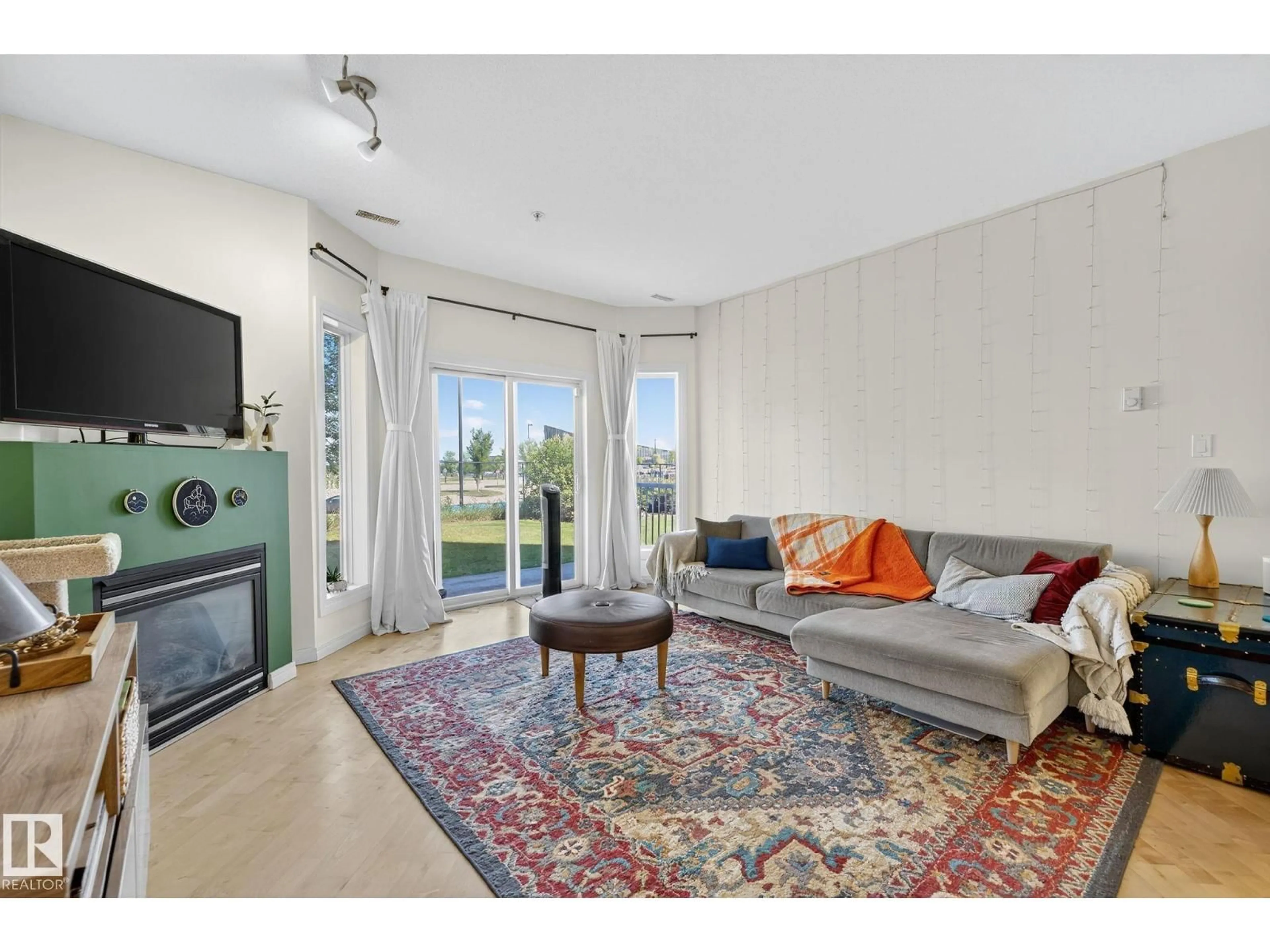 Living room with furniture, unknown for 111 - 4312 139 AV, Edmonton Alberta T5Y3J4