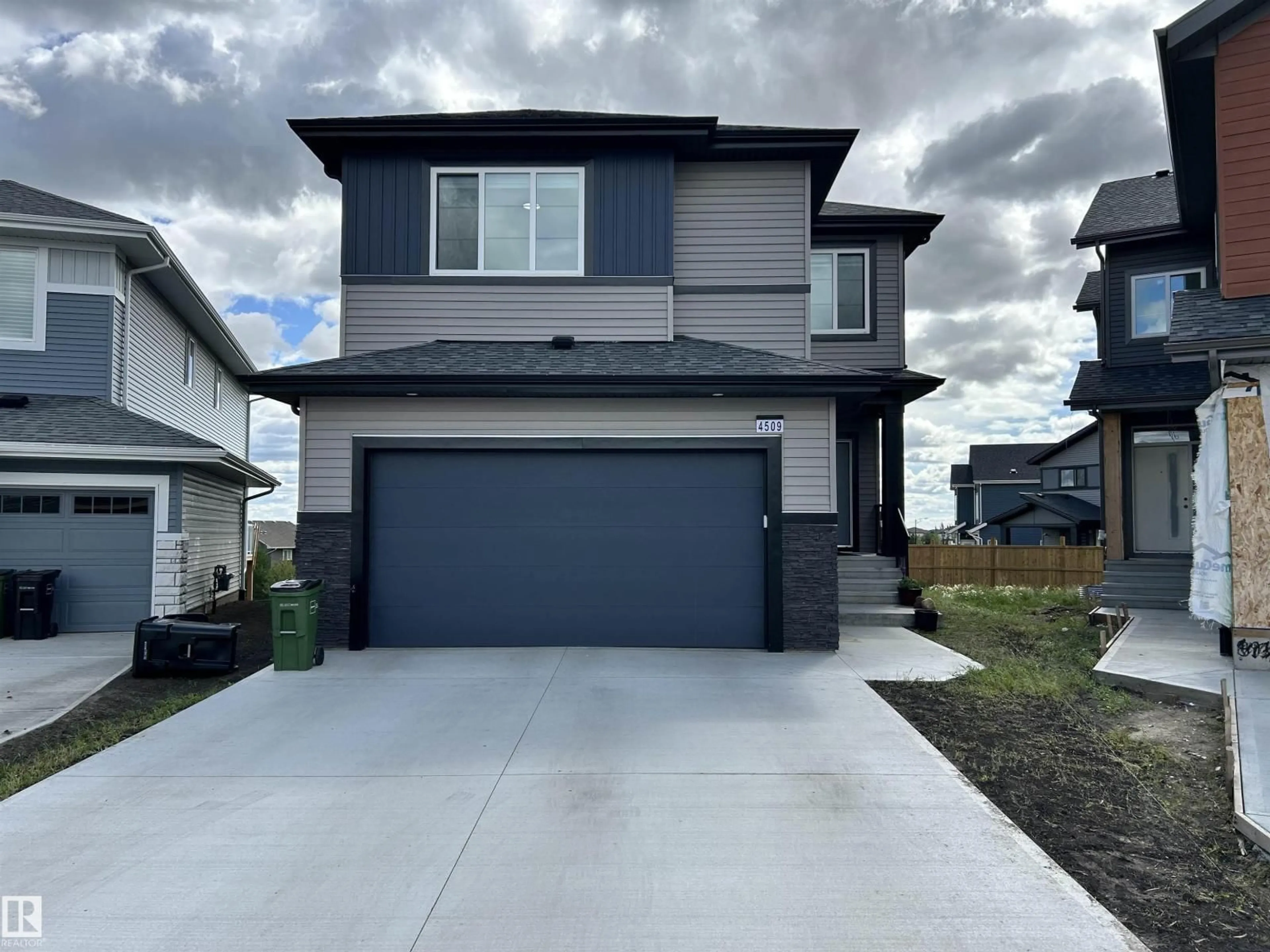 Home with vinyl exterior material, street for 4509 170A AV, Edmonton Alberta T5Y4C9