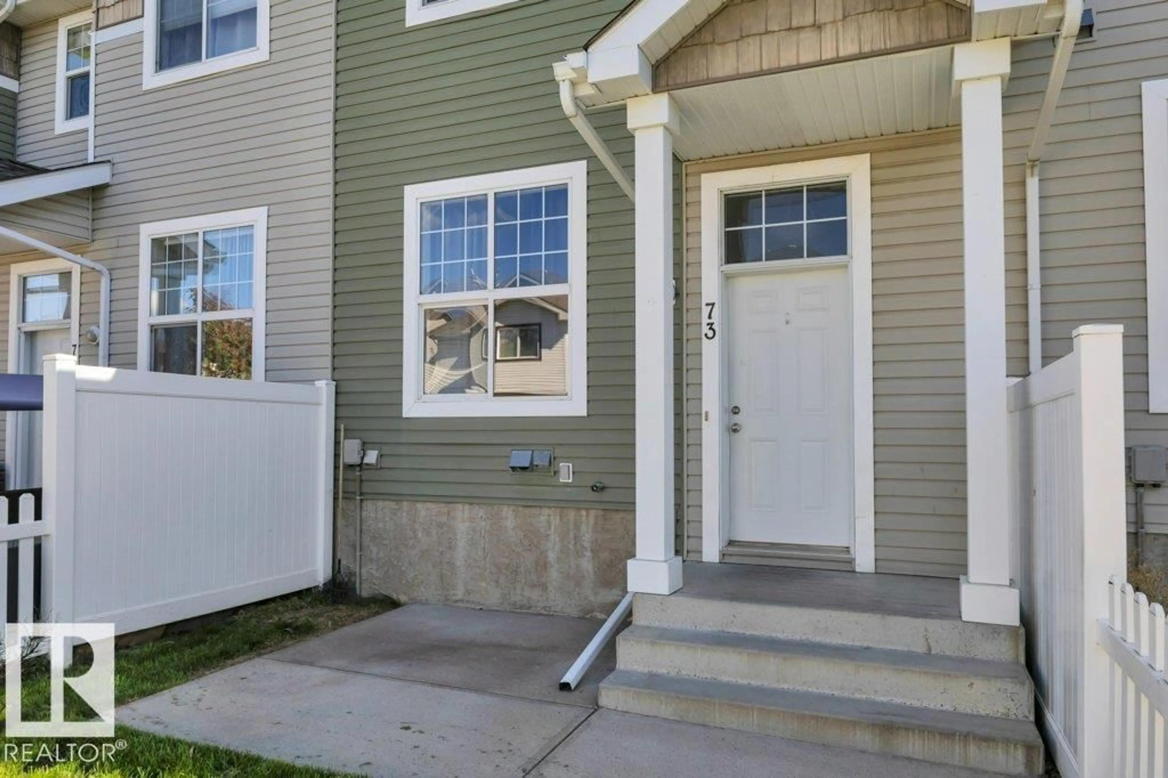 Home with vinyl exterior material, street for 73 - 5604 199 ST, Edmonton Alberta T6M2Z9