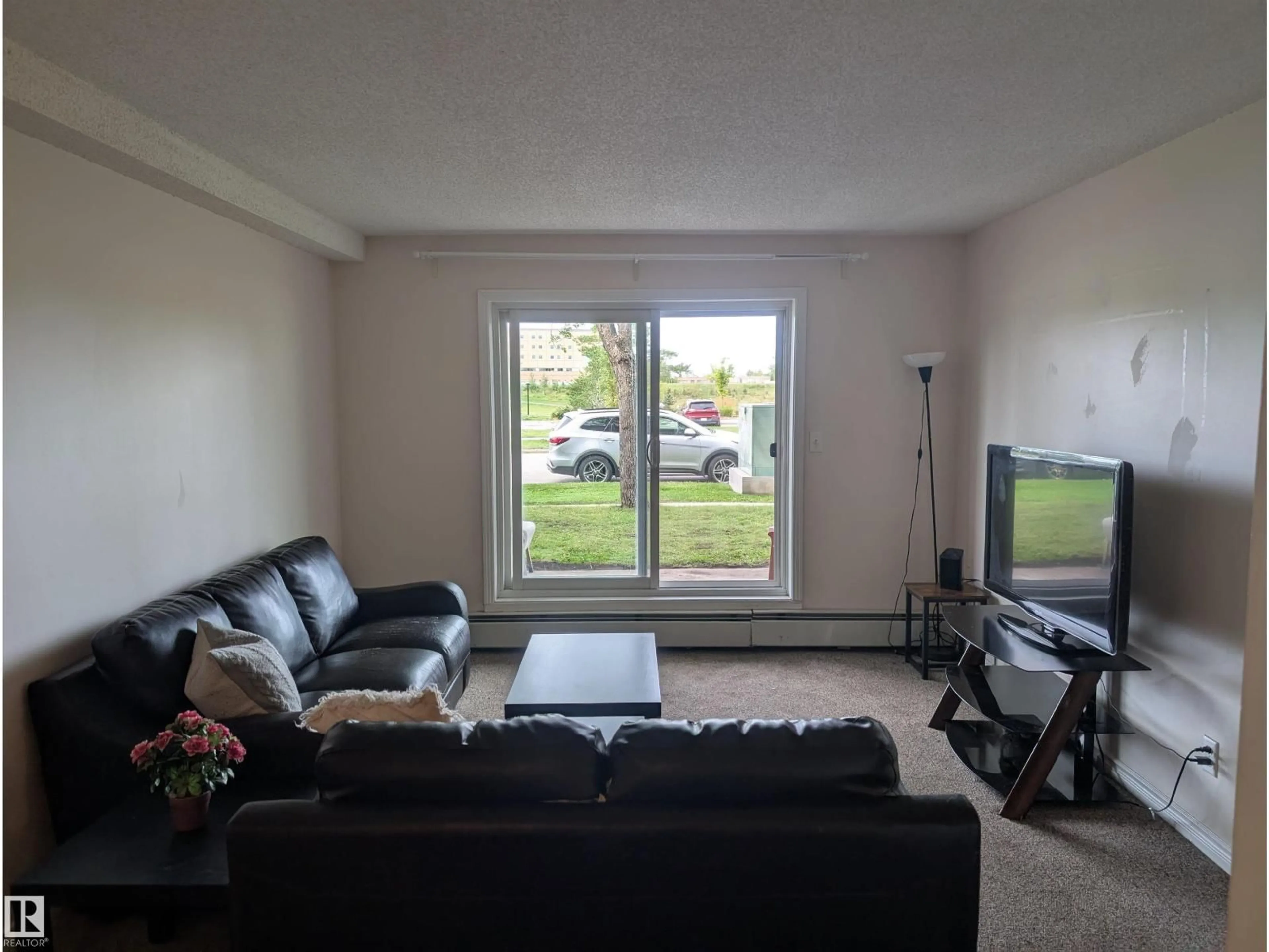 Living room with furniture, floor is not visible for #110 - 5065 31 AV, Edmonton Alberta T6L6S5
