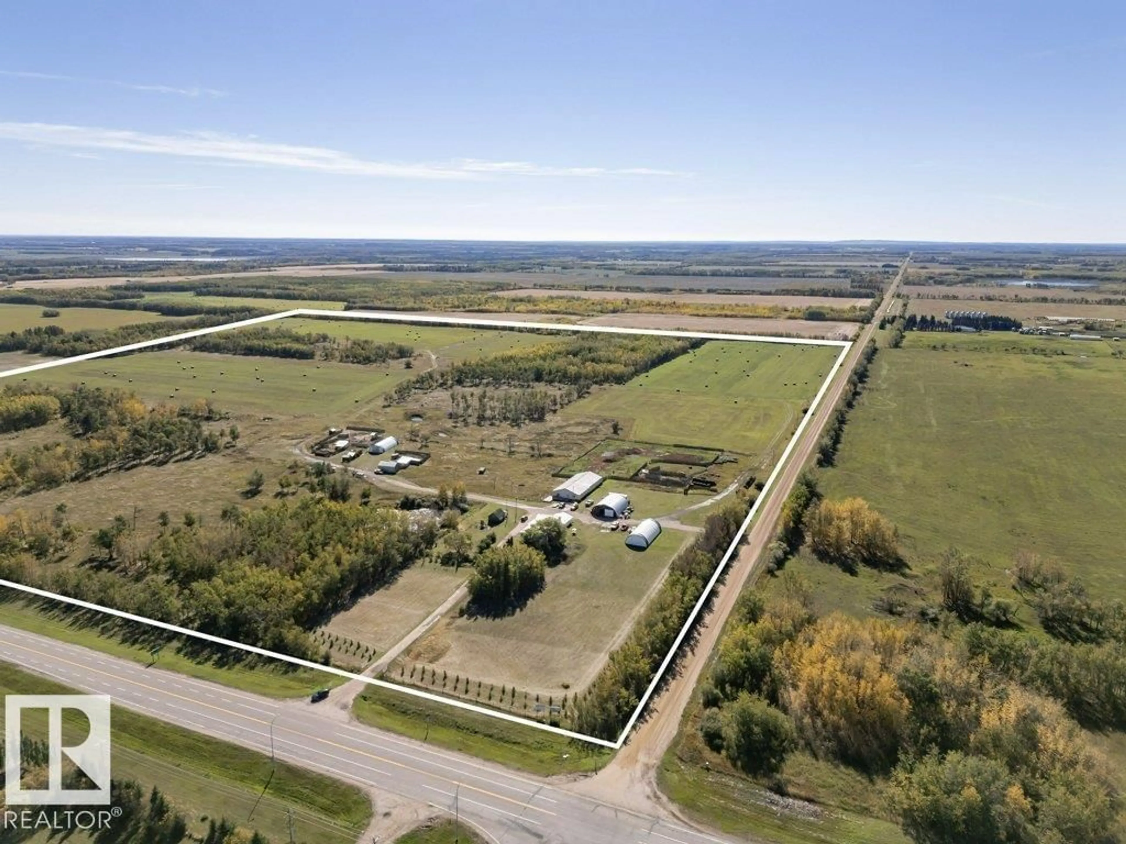A pic from outside/outdoor area/front of a property/back of a property/a pic from drone, unknown for 14722 HWY 28, Rural Smoky Lake County Alberta T0A3C0