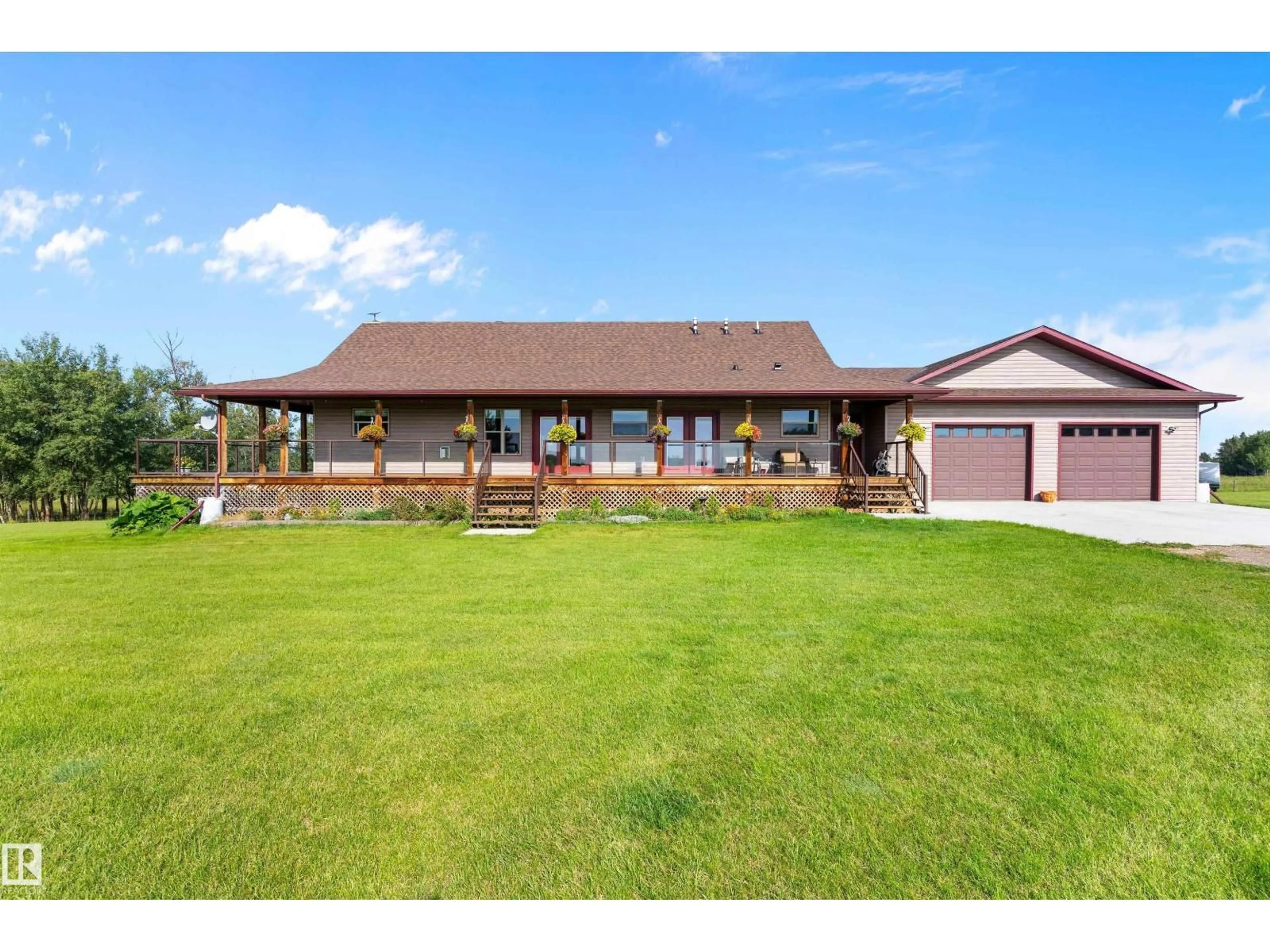 A pic from outside/outdoor area/front of a property/back of a property/a pic from drone, water/lake/river/ocean view for 1018 TWP ROAD 512, Rural Parkland County Alberta T7Y2N6