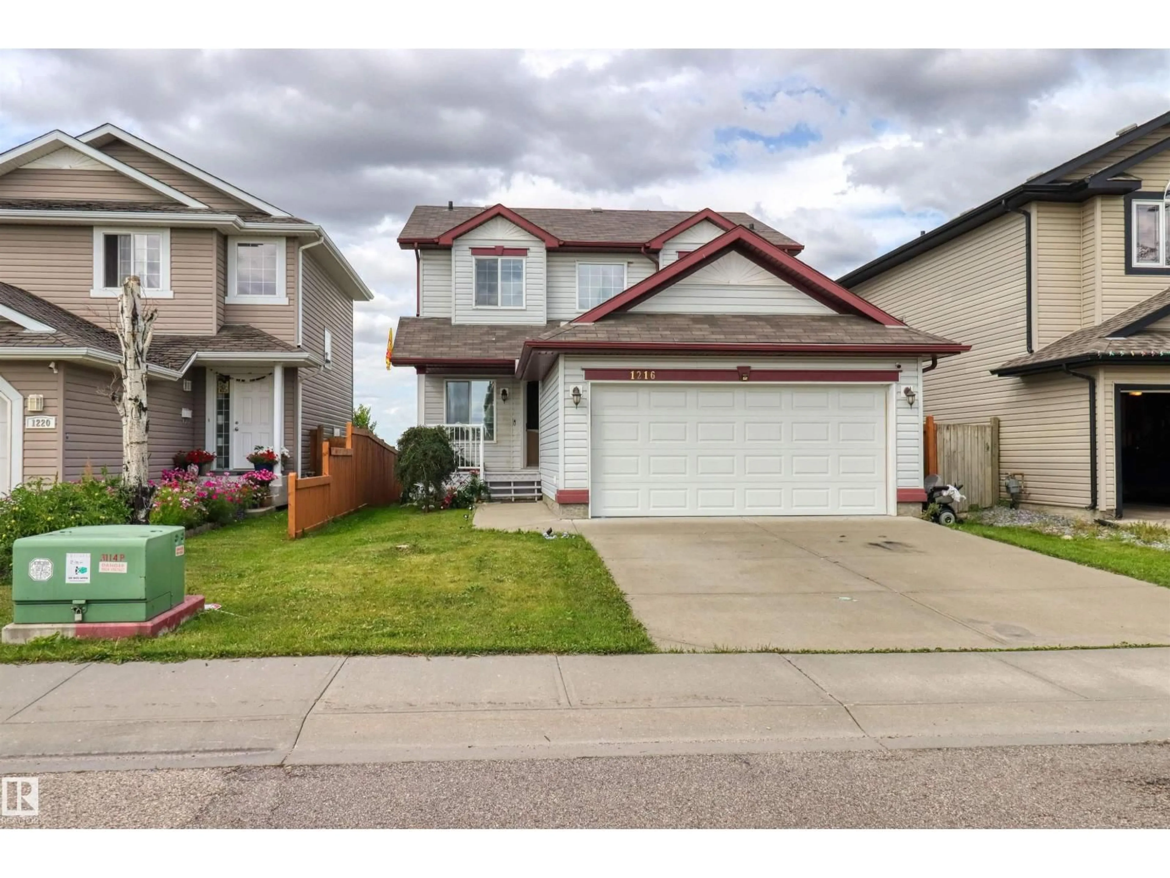 Home with vinyl exterior material, street for 1216 36C AVE AVE, Edmonton Alberta T6T0E5