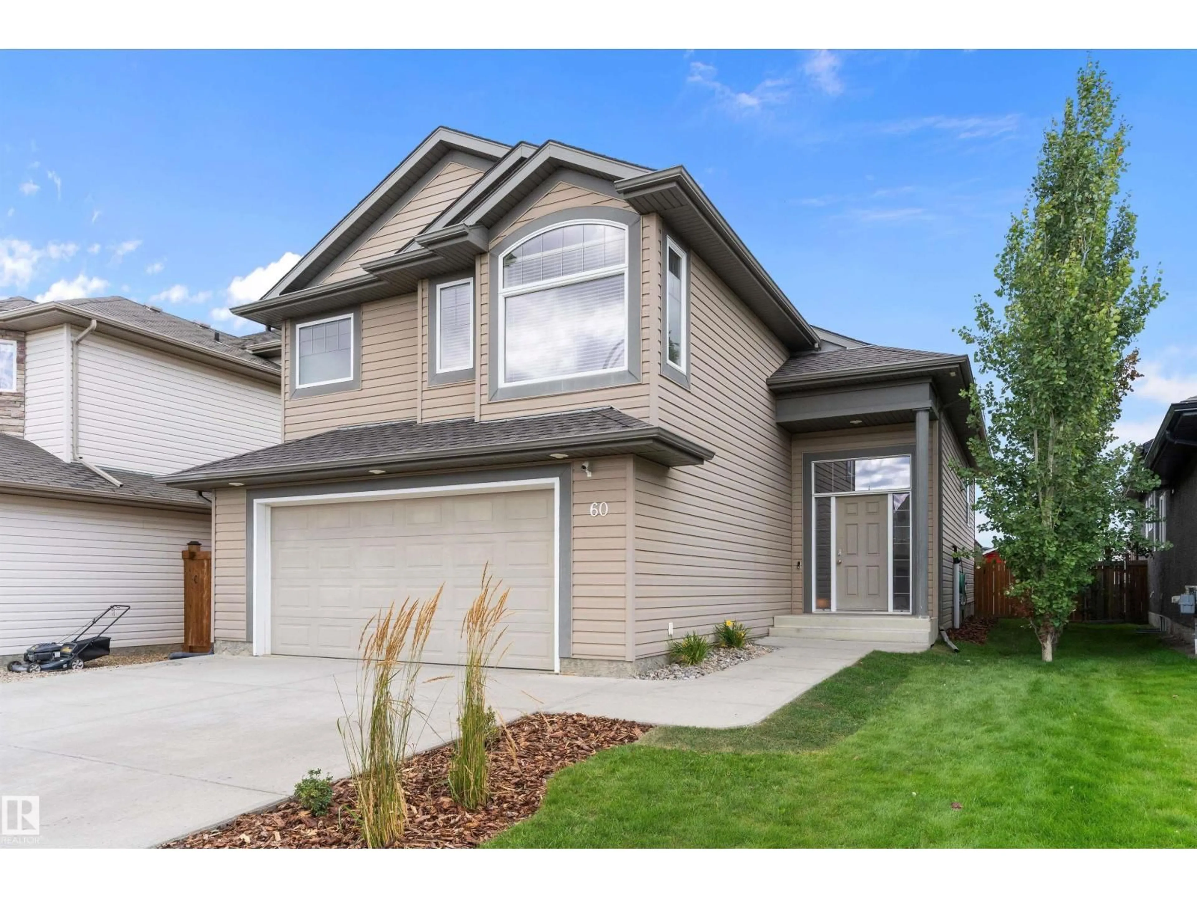 Home with vinyl exterior material, street for 60 HANEY CO, Spruce Grove Alberta T7X0B3