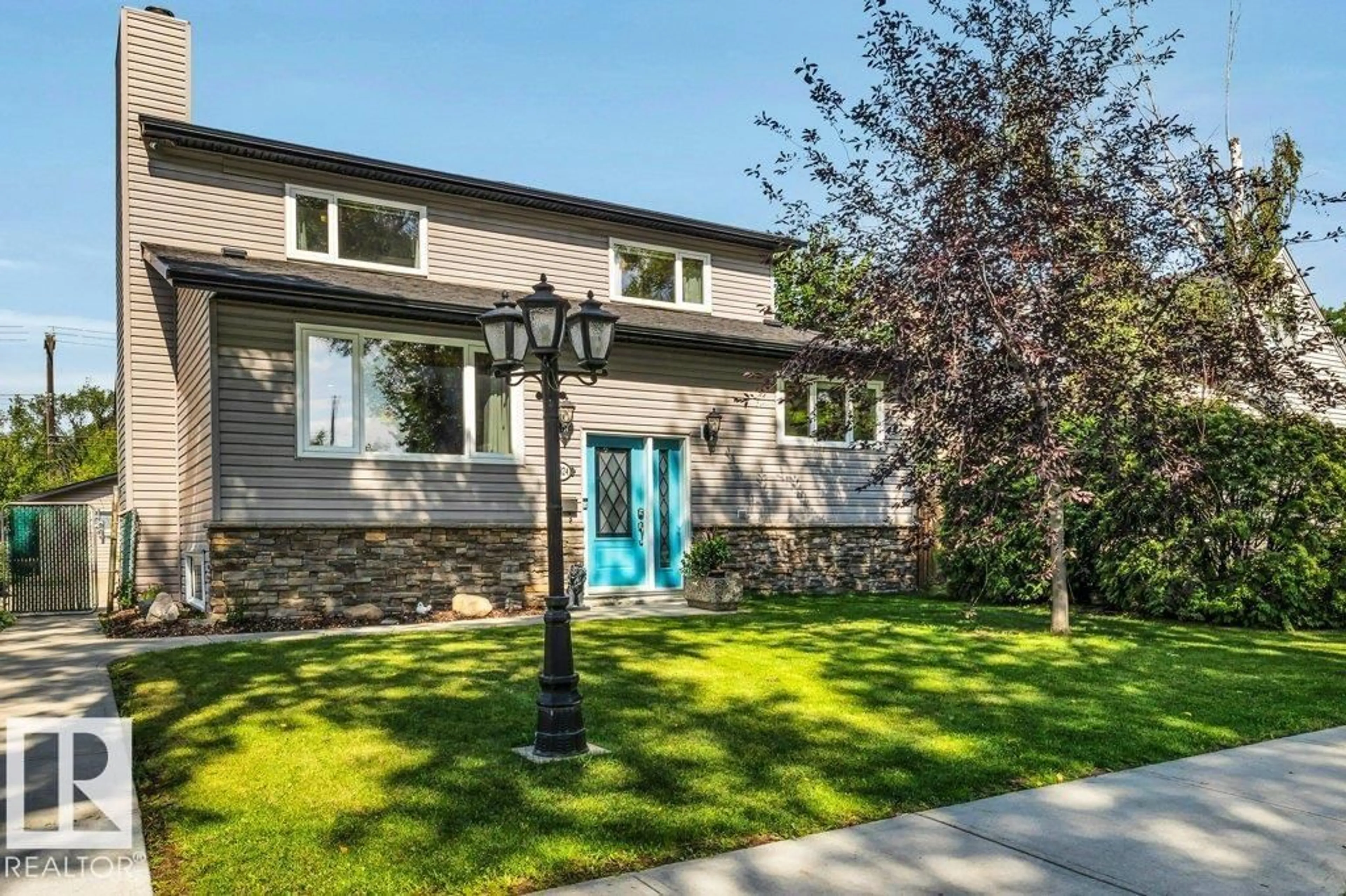 Home with brick exterior material, street for NW - 13824 110A AV, Edmonton Alberta T5M2M9