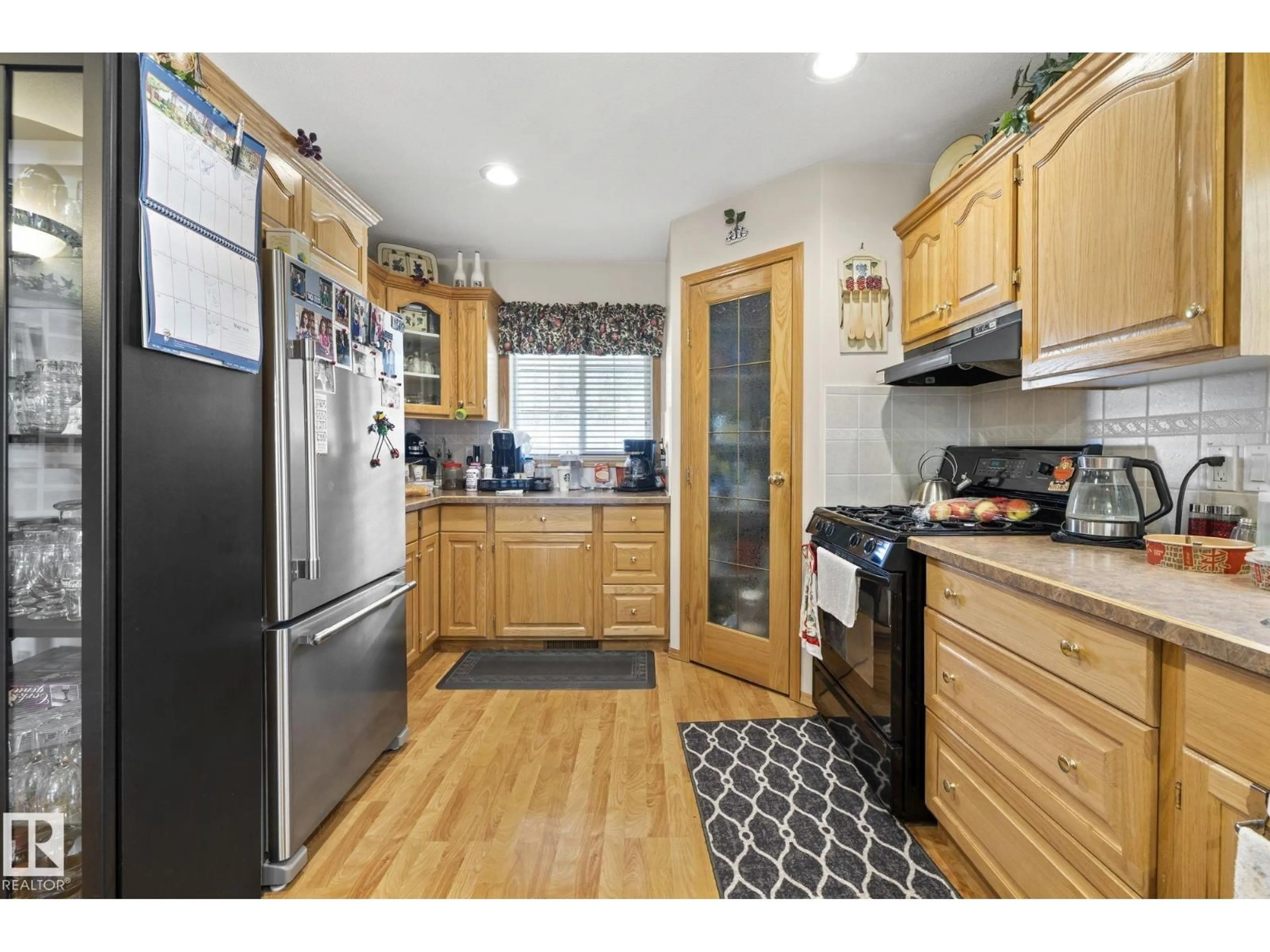 Standard kitchen, wood/laminate floor for 60201 RNG RD, Rural St. Paul County Alberta T0A0N0