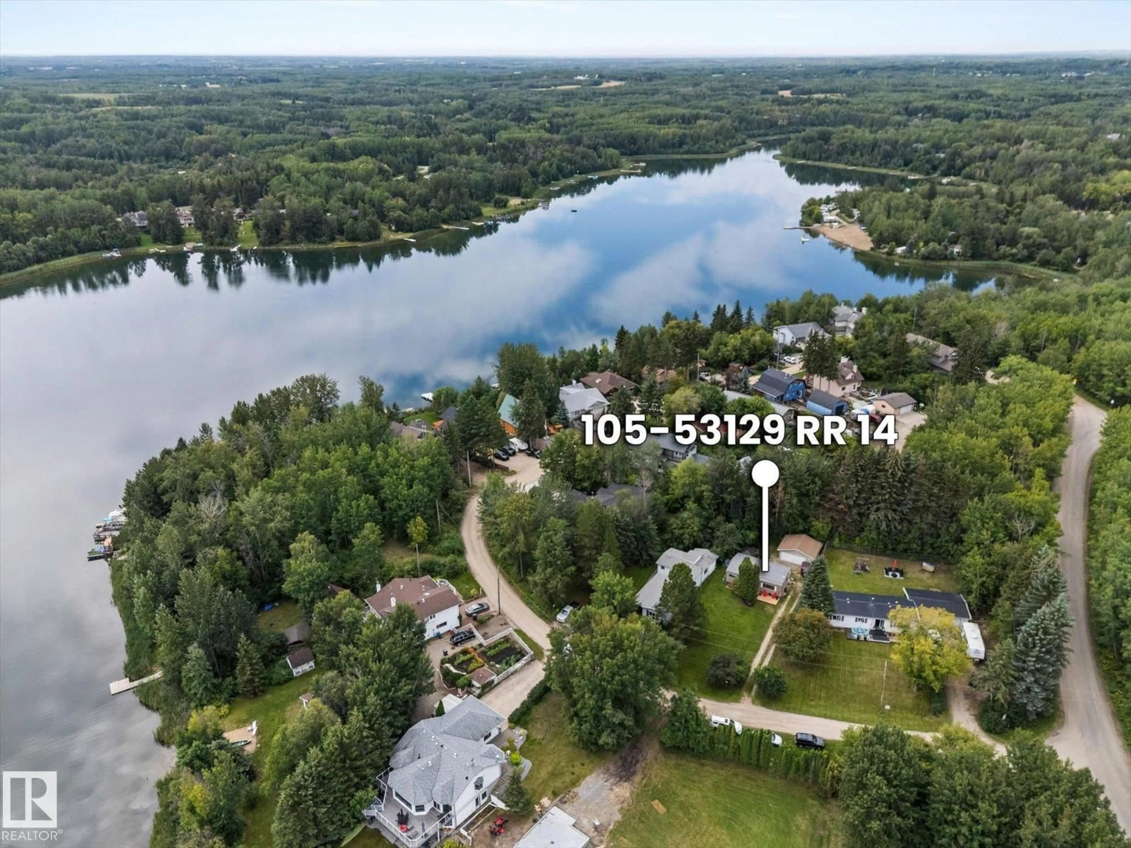 A pic from outside/outdoor area/front of a property/back of a property/a pic from drone, water/lake/river/ocean view for 105 - 53129 RGE ROAD 14, Rural Parkland County Alberta T7Y2T3