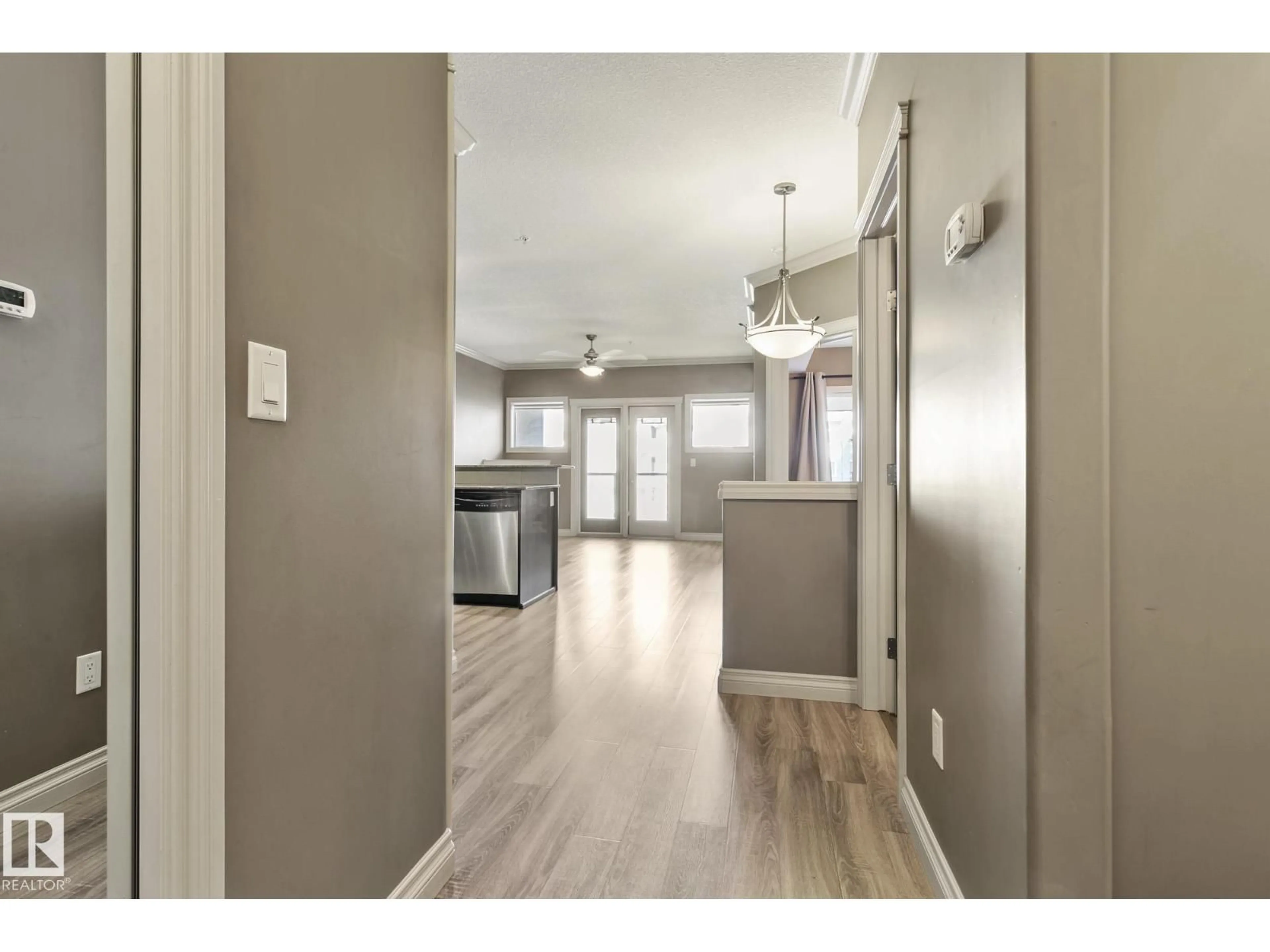 Open concept kitchen, wood/laminate floor for #334 - 10121 80 AV, Edmonton Alberta T6E0B9