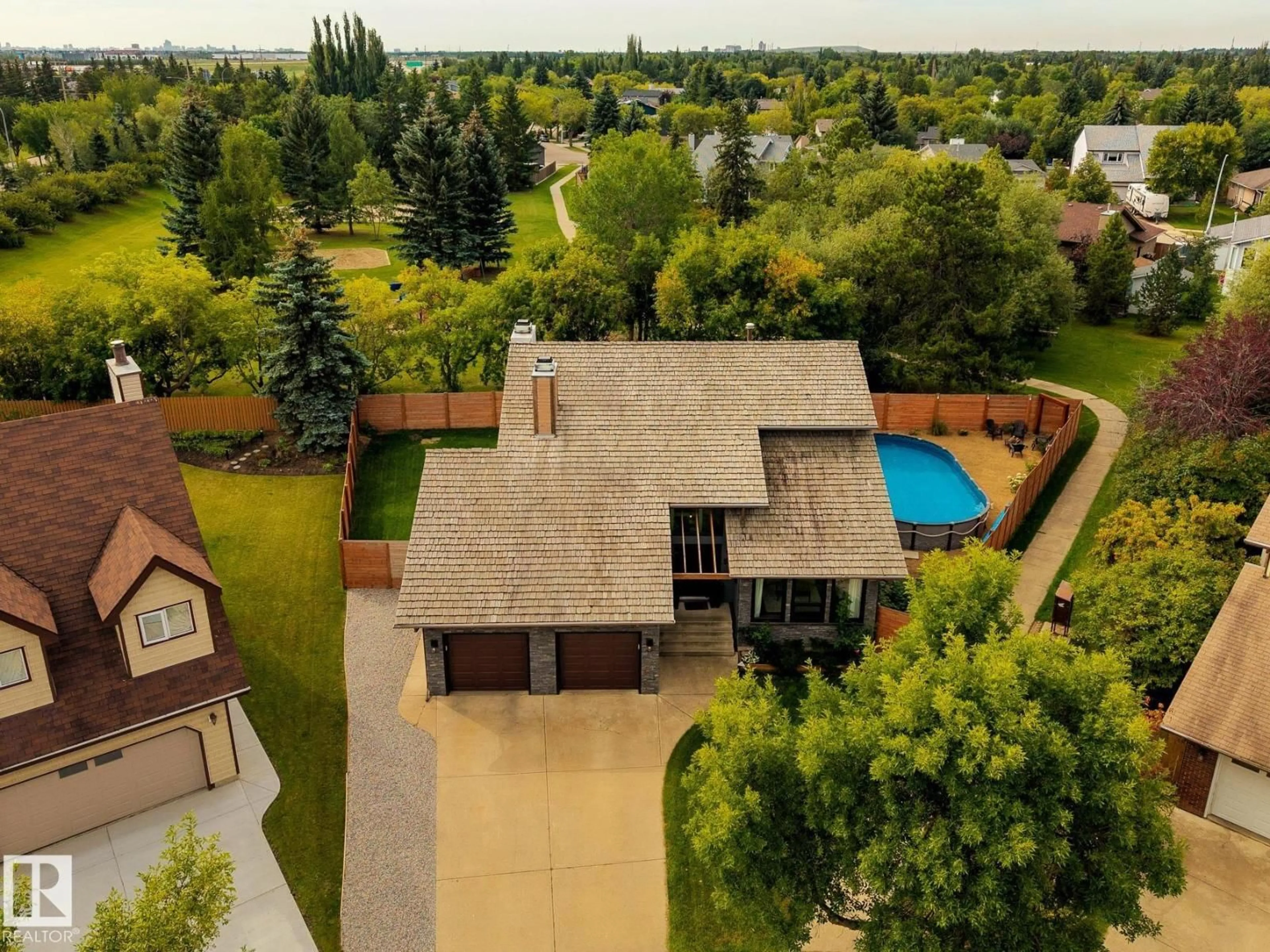 A pic from outside/outdoor area/front of a property/back of a property/a pic from drone, unknown for 50 PEMBROKE CR, St. Albert Alberta T8N4S3