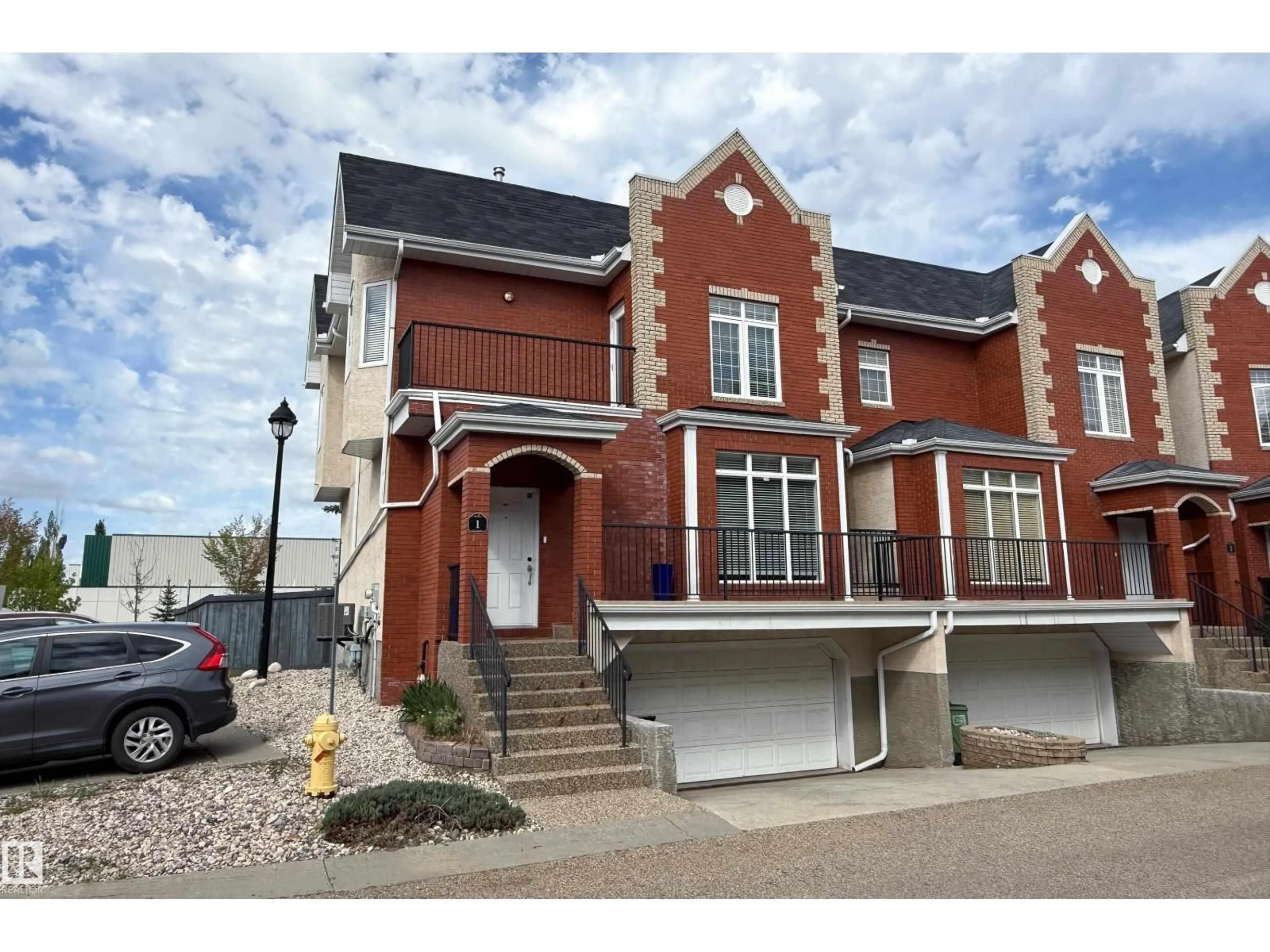 Home with brick exterior material, street for 8403 164 AV, Edmonton Alberta T5Z3Y2