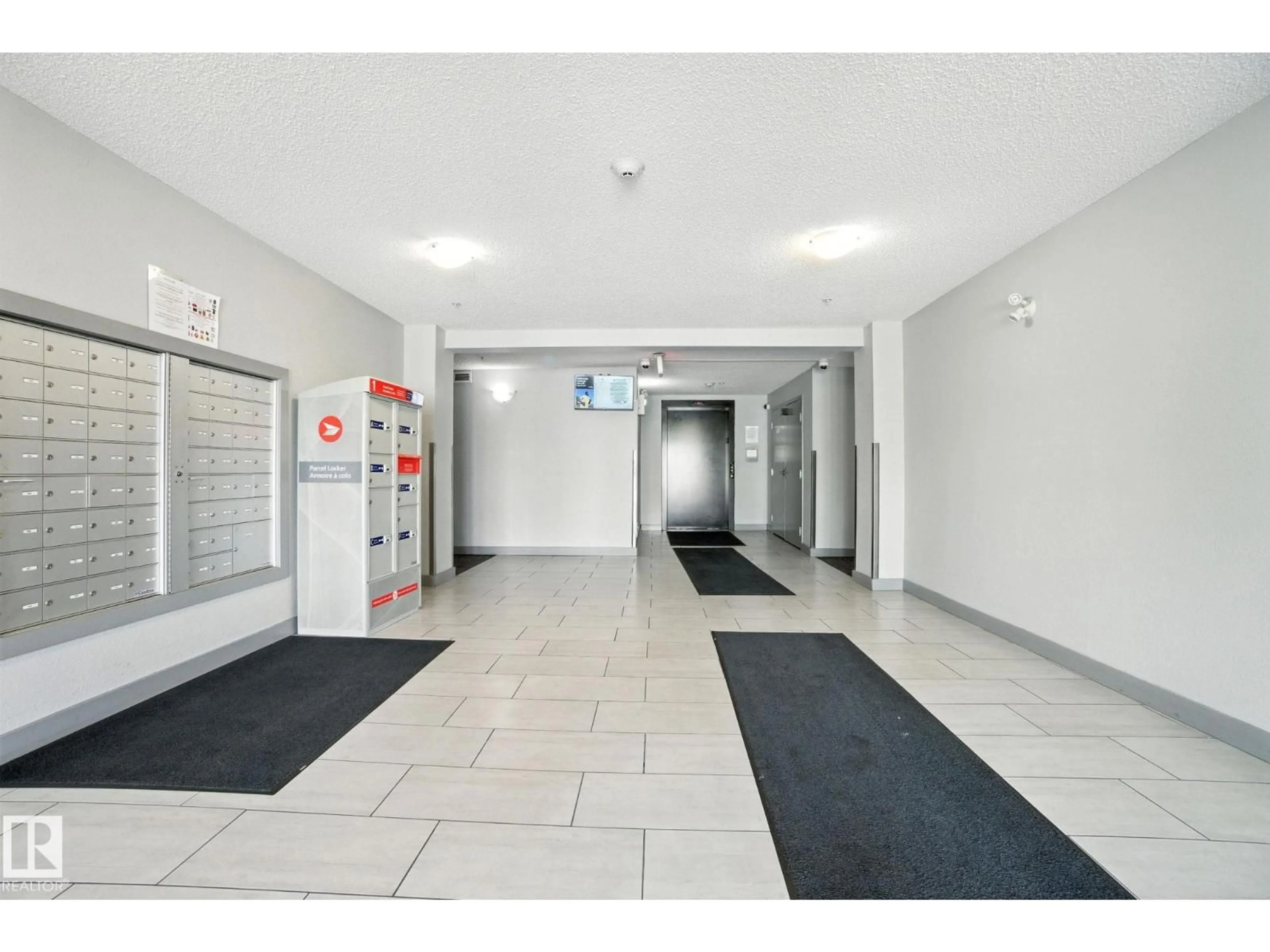 Indoor foyer for #207 - 11820 22 AV, Edmonton Alberta T6W2A2
