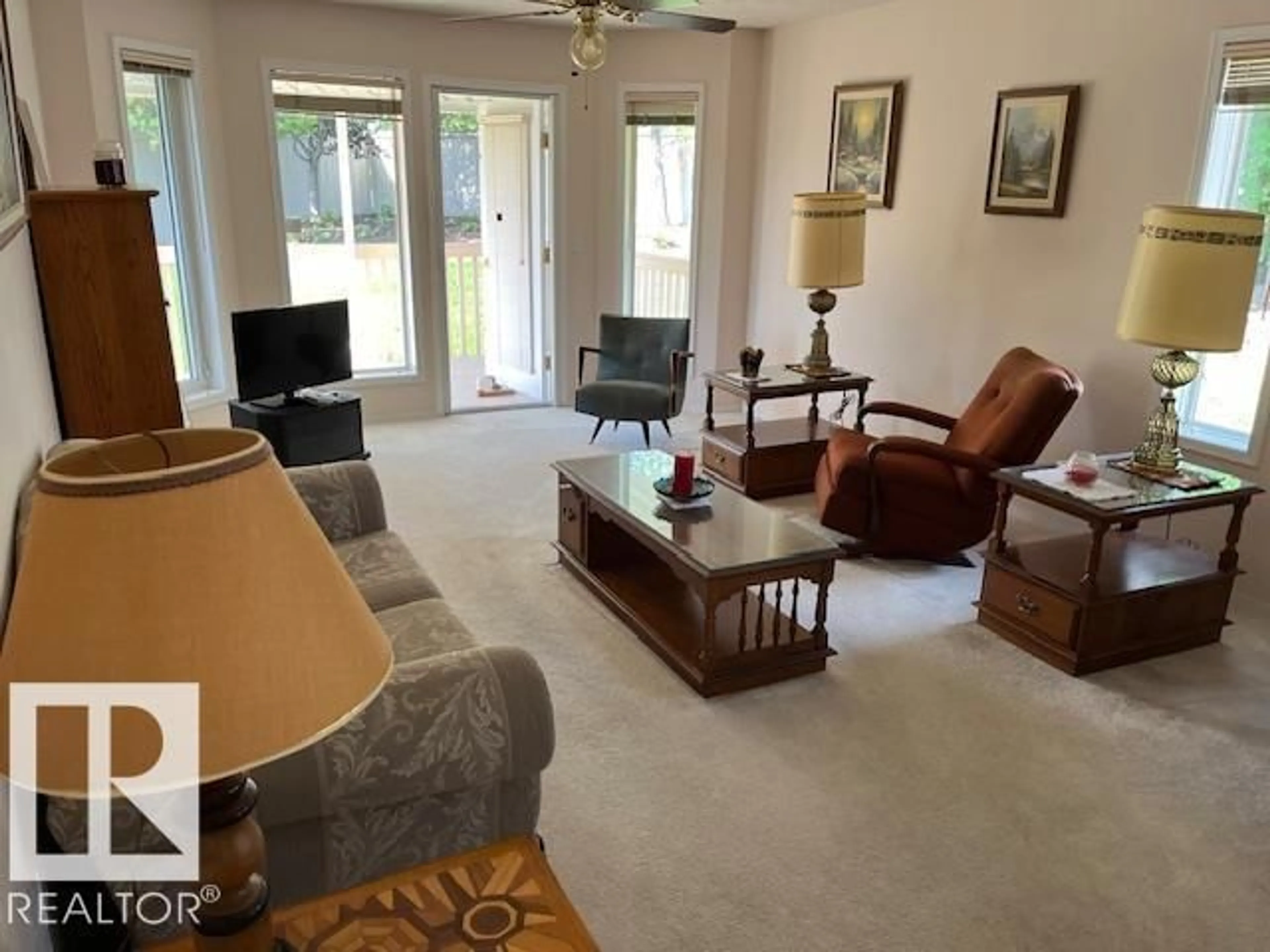 Living room with furniture, unknown for 20 - 14428 MILLER BV, Edmonton Alberta T5Y2Y6