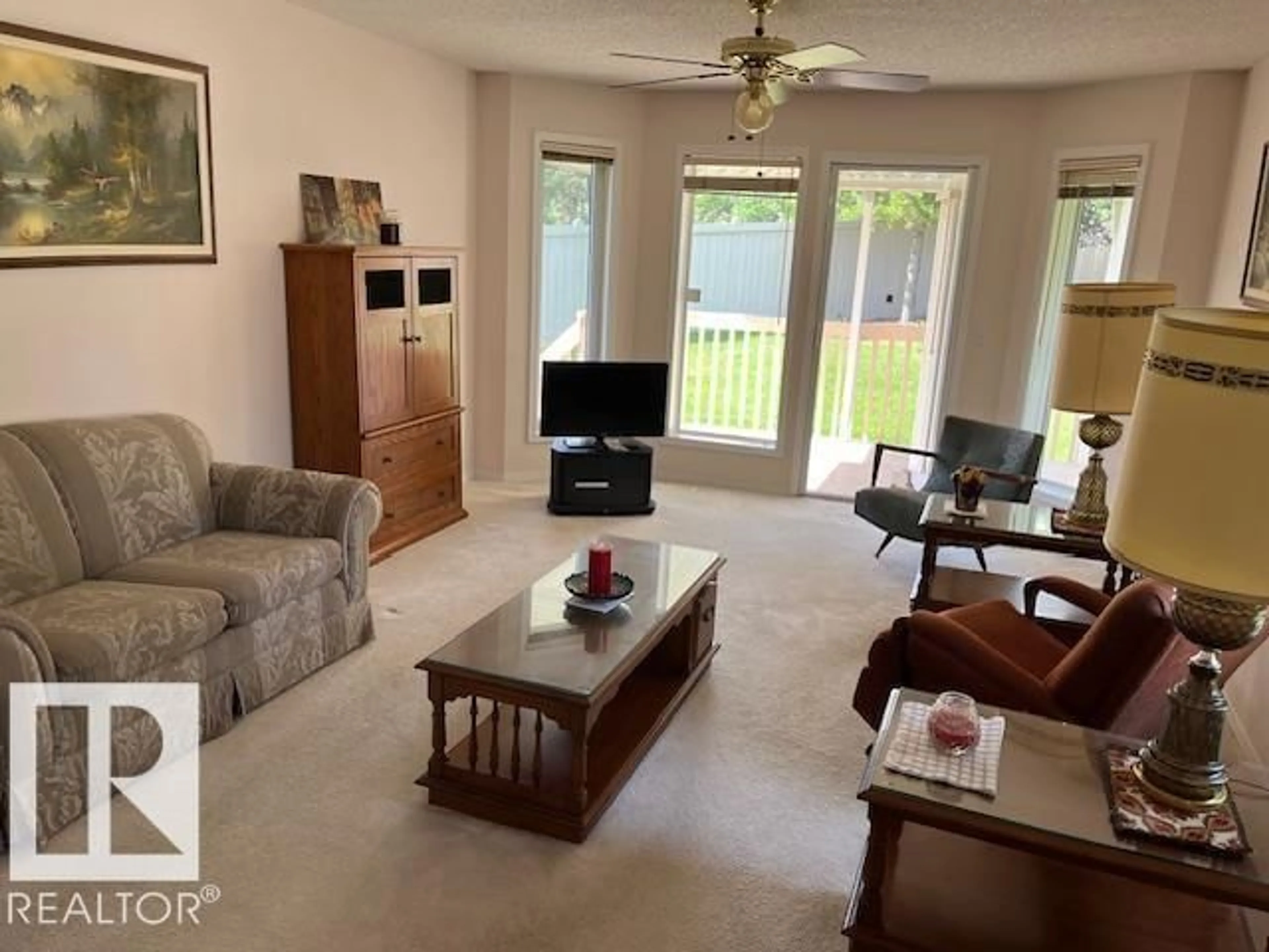 Living room with furniture, unknown for 20 - 14428 MILLER BV, Edmonton Alberta T5Y2Y6