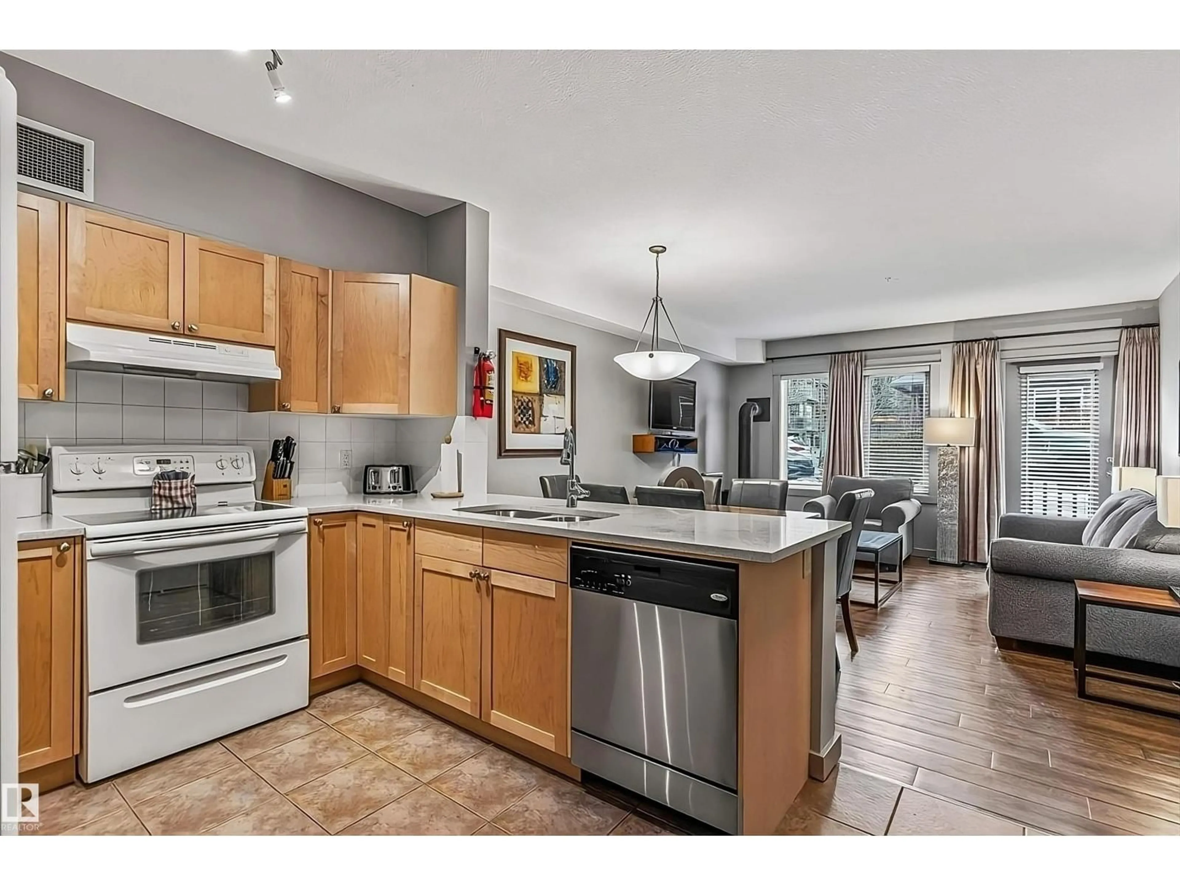 Open concept kitchen, unknown for #114 - 109 MONTANE RD, Canmore Alberta T1W3J2