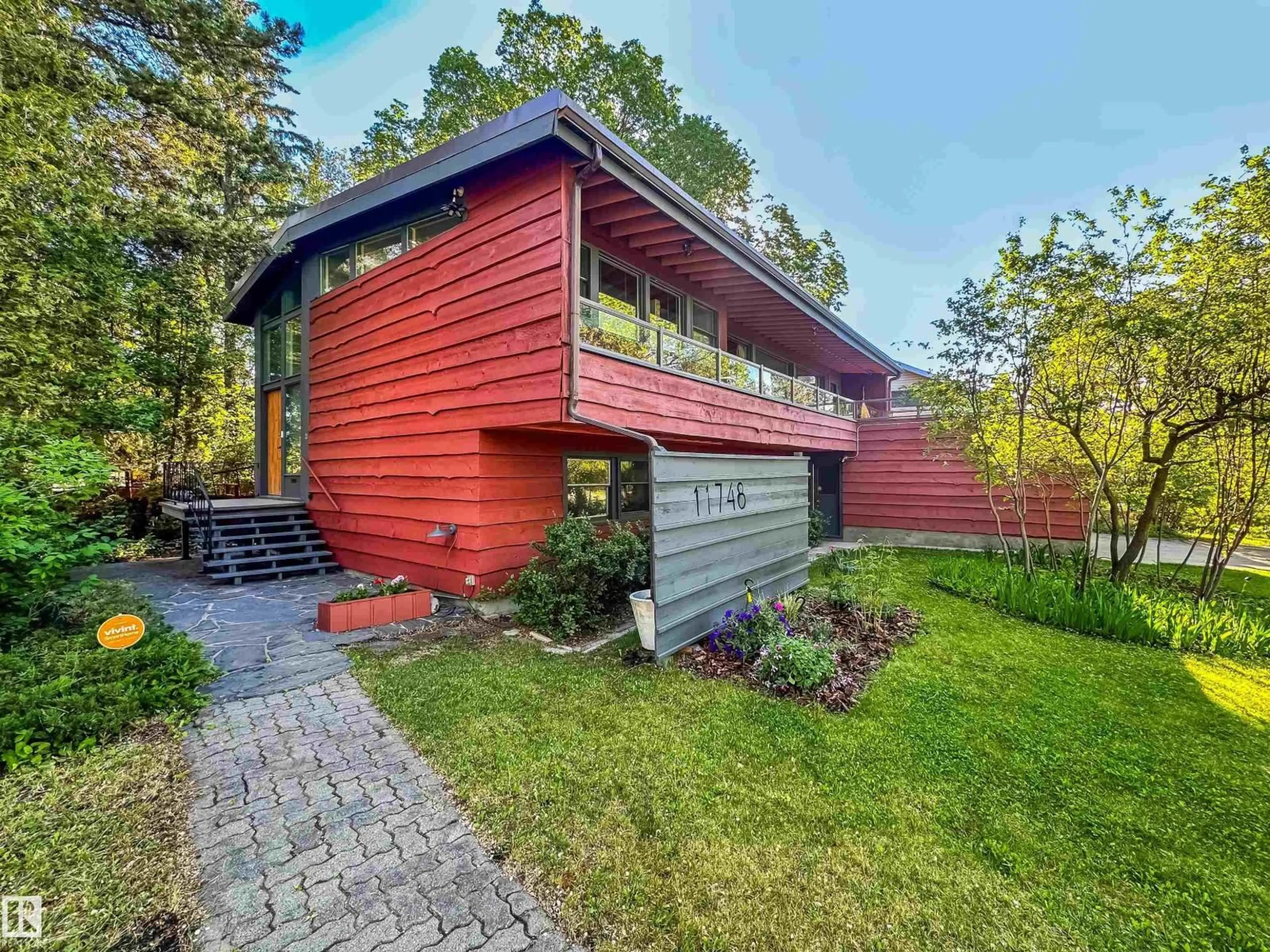 Home with brick exterior material, street for 11748 UNIVERSITY AV NW, Edmonton Alberta T6G1Z5