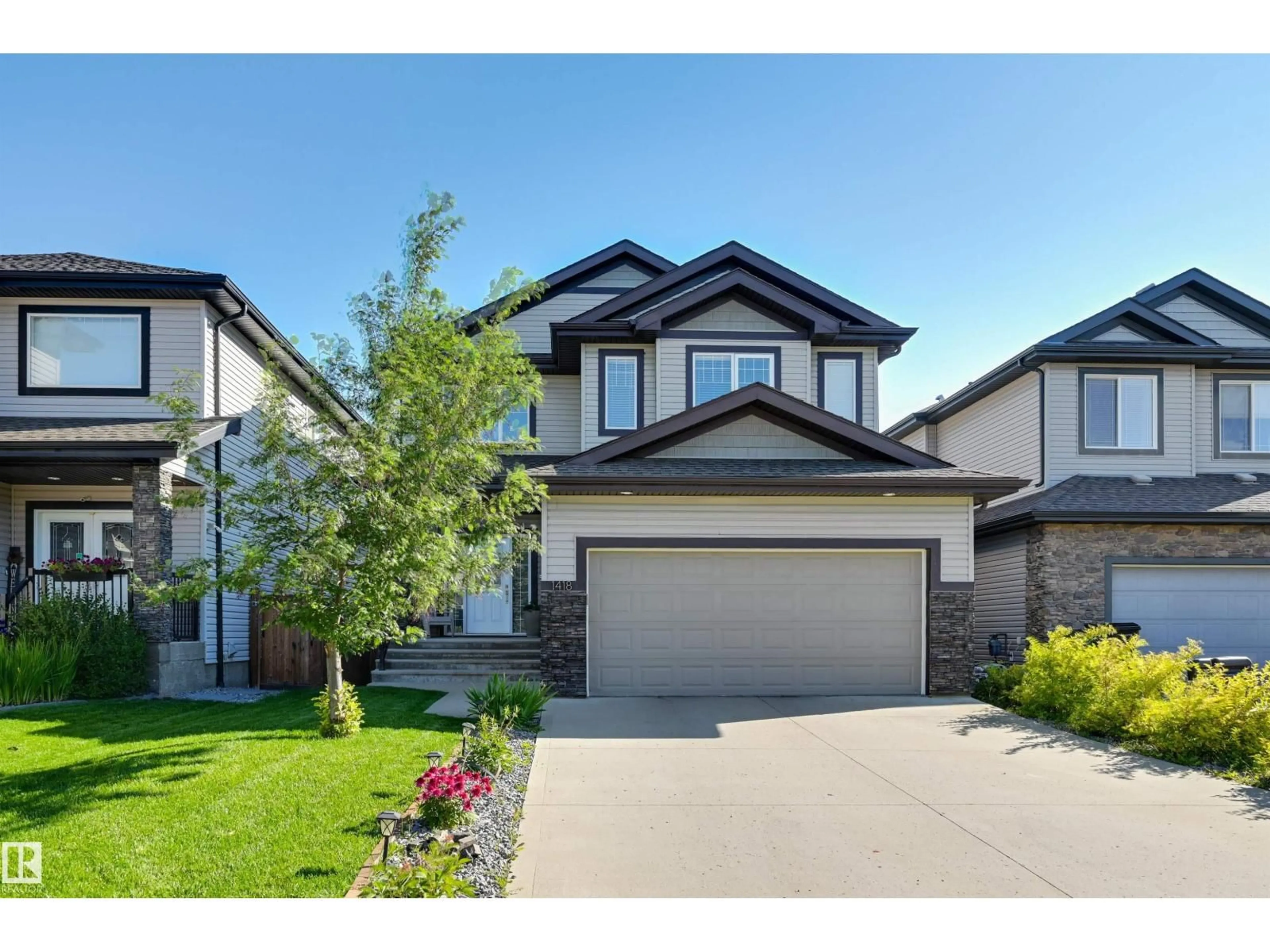 Home with vinyl exterior material, street for NW - 1418 HAYS WY, Edmonton Alberta T6M0M3