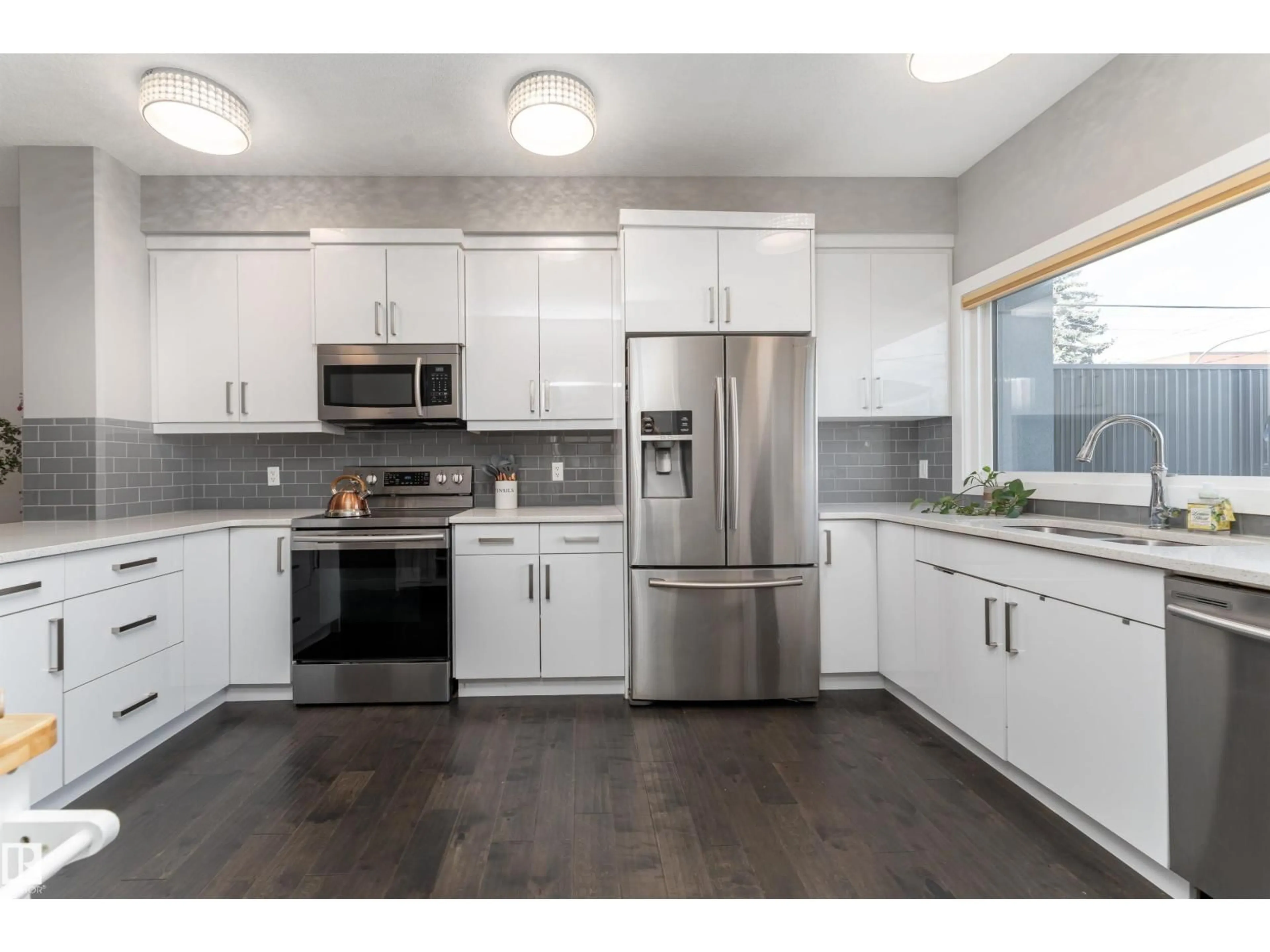 Open concept kitchen, unknown for NW - 8954 81 AV, Edmonton Alberta T6C0W8