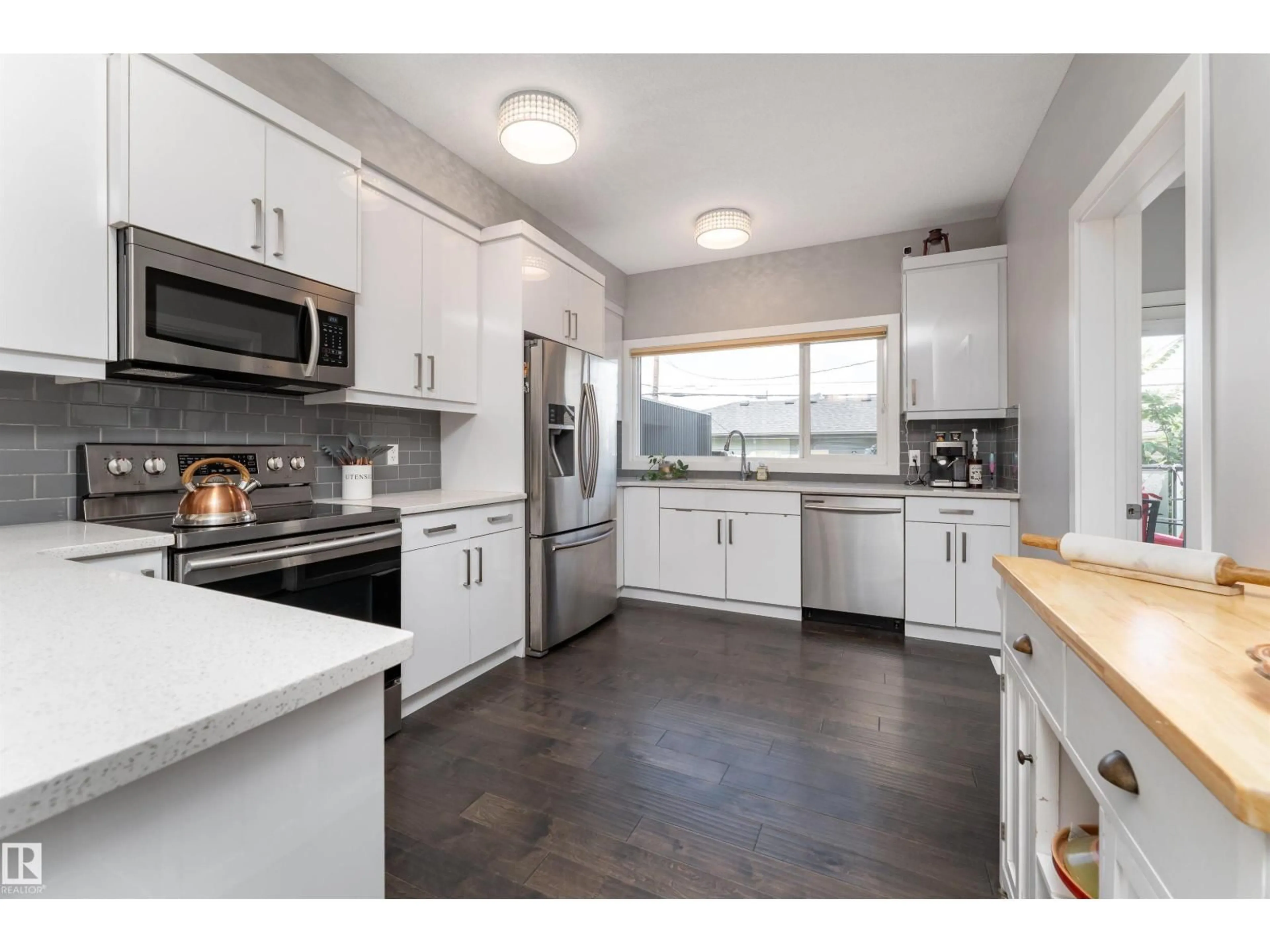 Open concept kitchen, unknown for NW - 8954 81 AV, Edmonton Alberta T6C0W8
