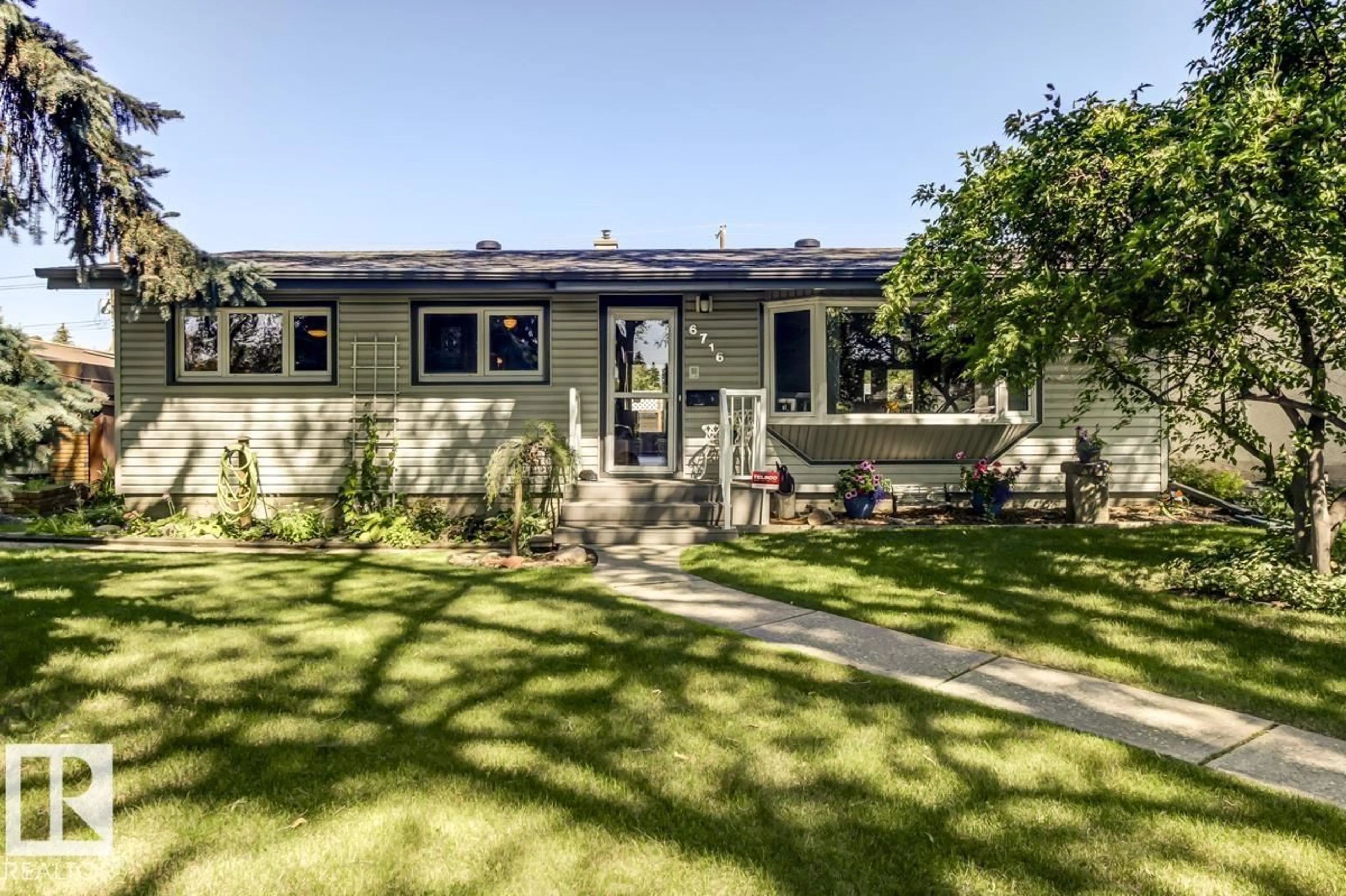 Home with vinyl exterior material, street for 6716 101A AV, Edmonton Alberta T6A0M2