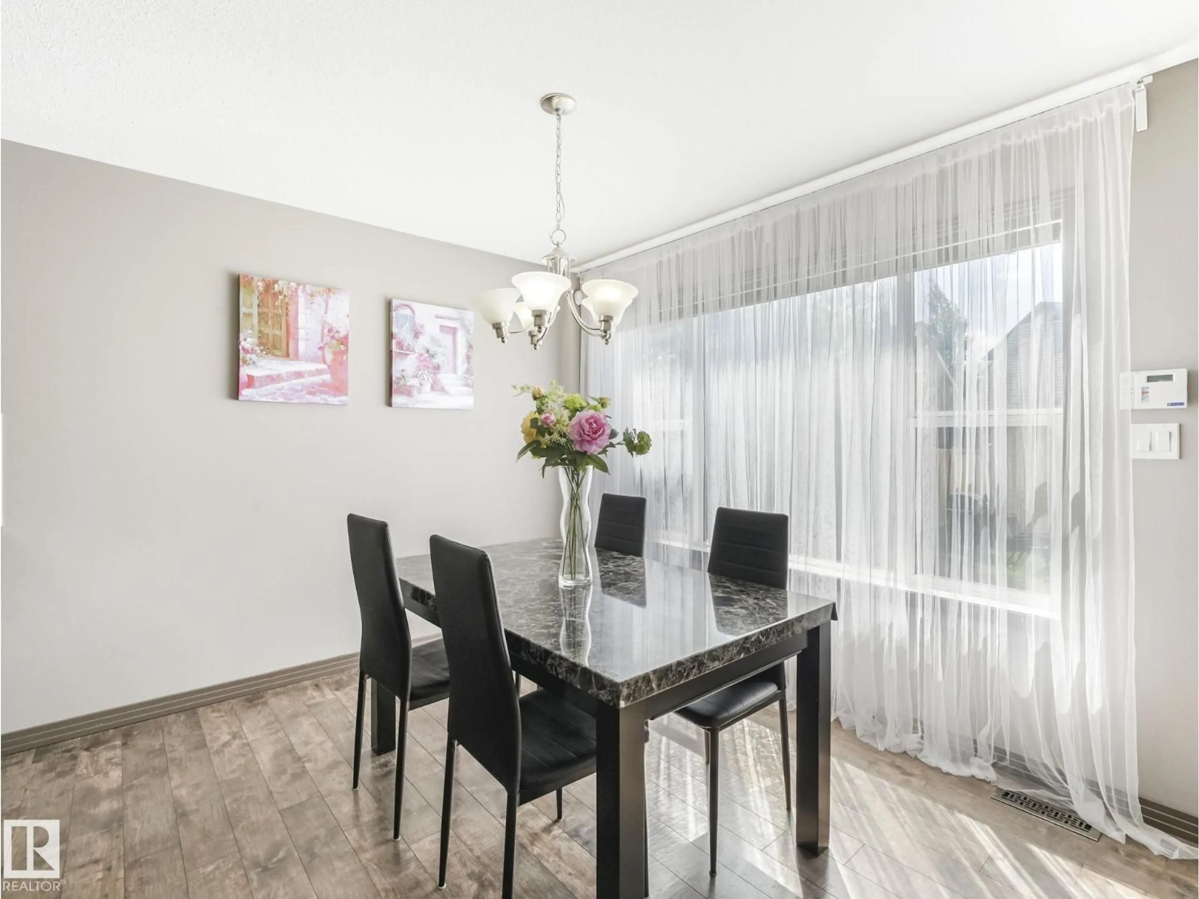 Dining room, wood/laminate floor for 2353 ASPEN TR, Sherwood Park Alberta T8H0G3