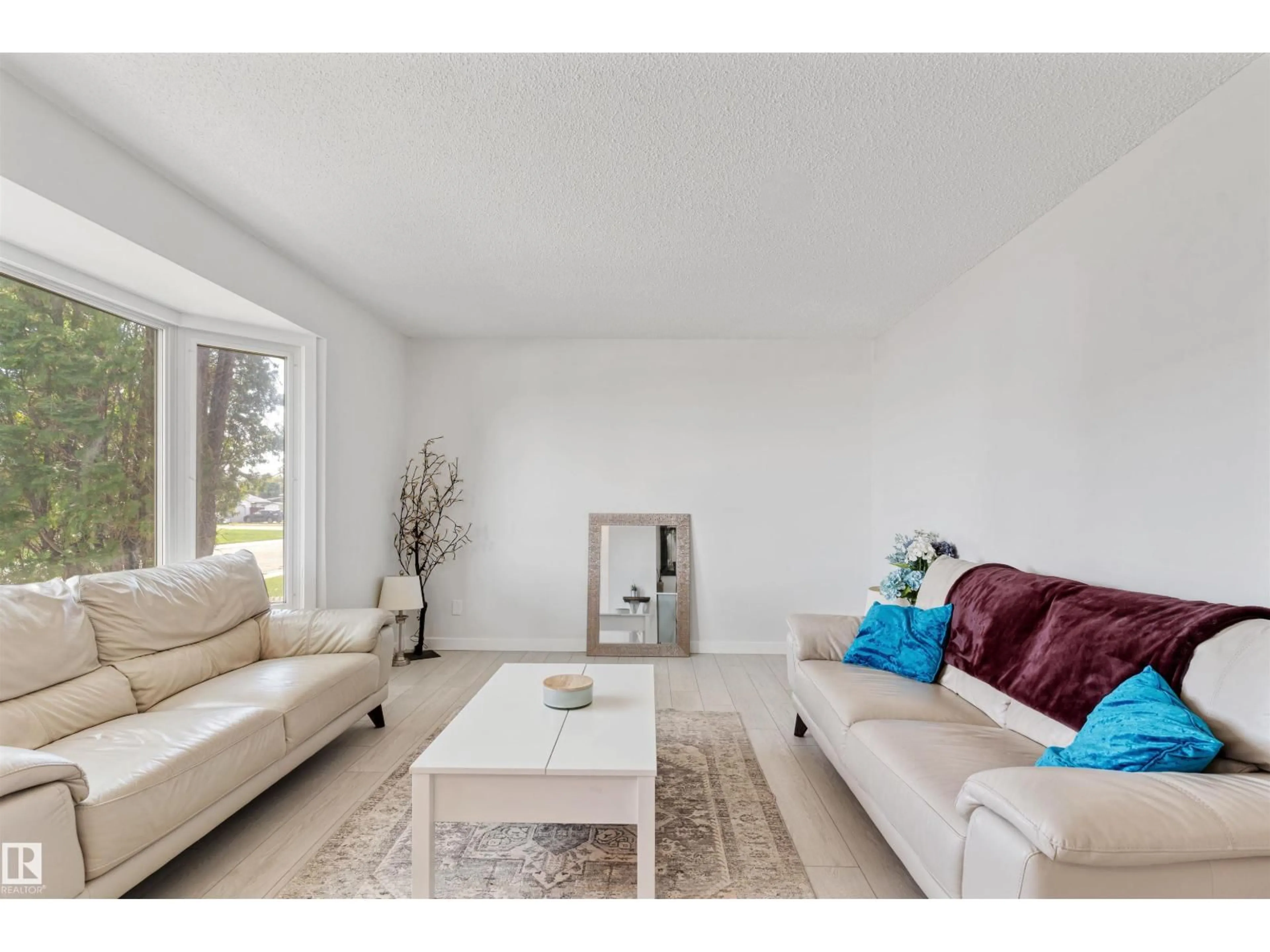 Living room with furniture, unknown for 5614 48A ST, Vegreville Alberta T9C1G7