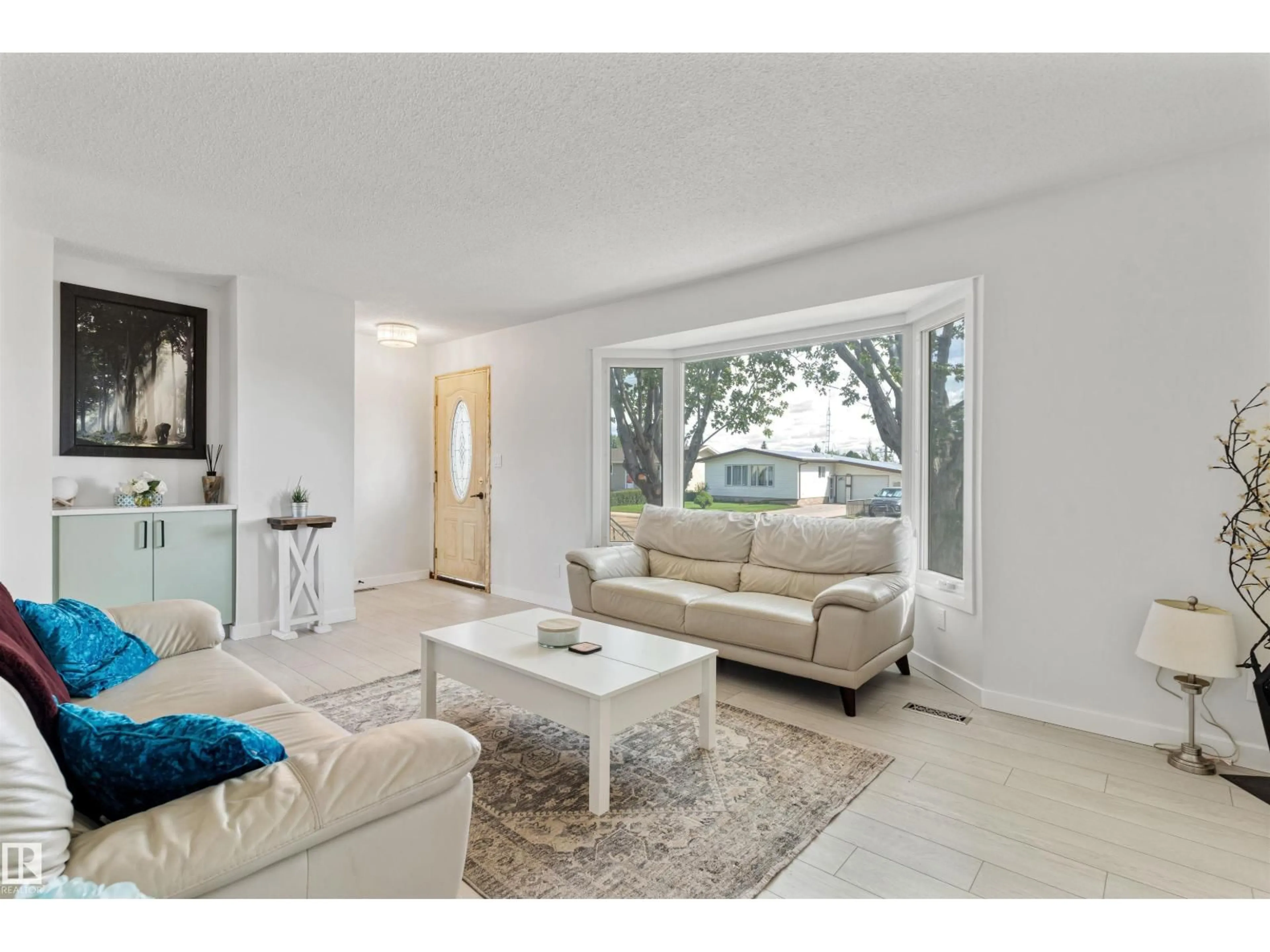 Living room with furniture, unknown for 5614 48A ST, Vegreville Alberta T9C1G7