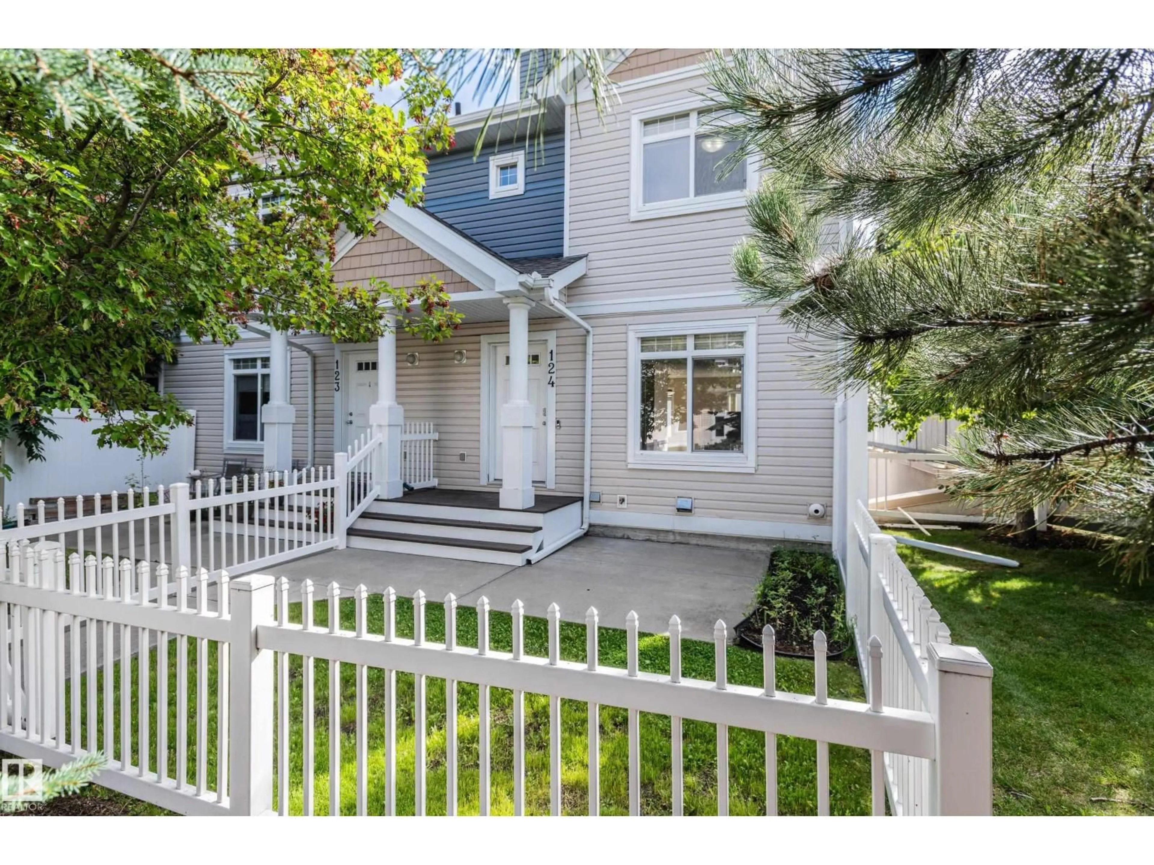 Home with vinyl exterior material, street for #124 - 1804 70 ST, Edmonton Alberta T6X0H4