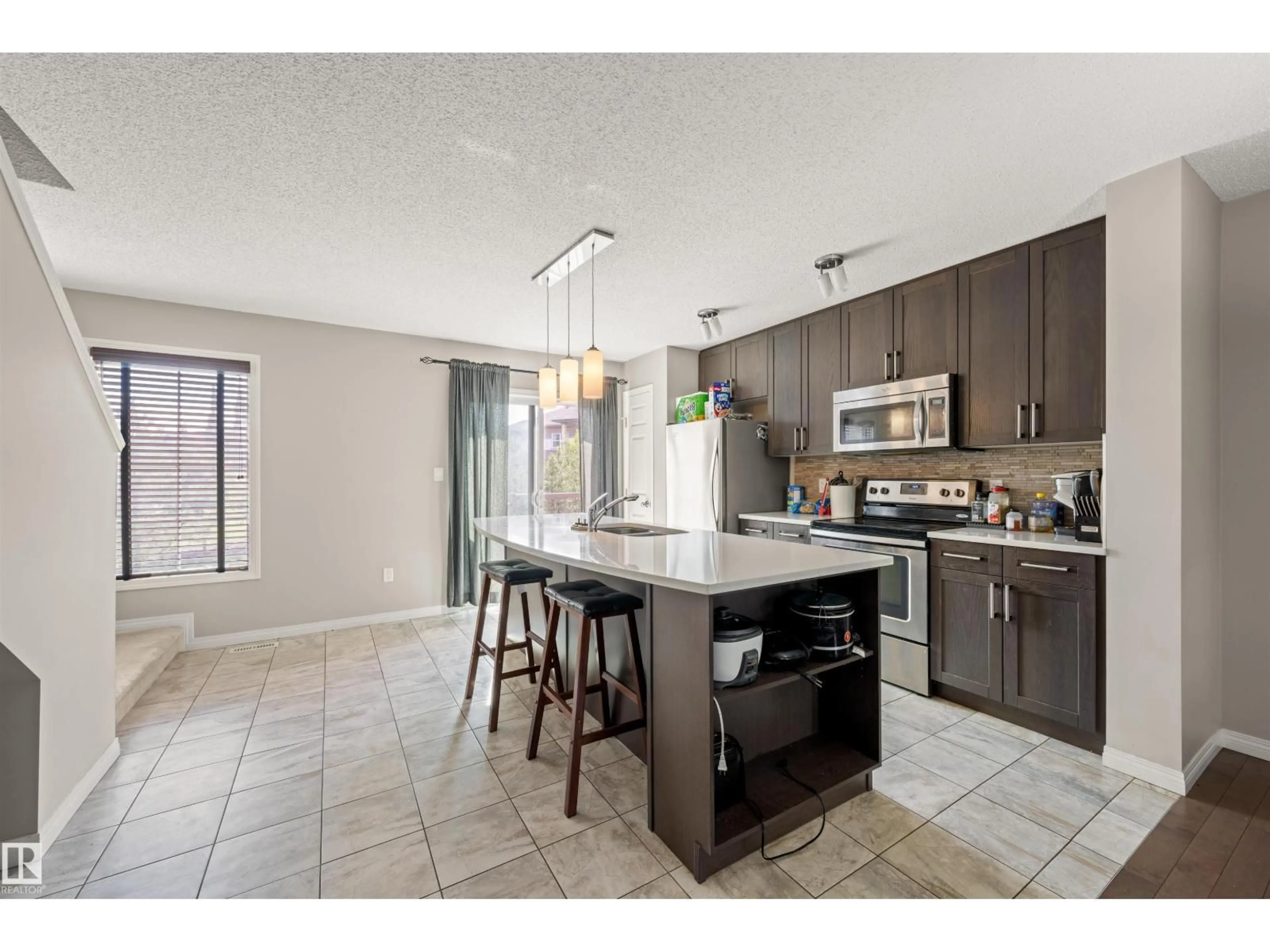 Open concept kitchen, ceramic/tile floor for 4021 ORCHARDS DR, Edmonton Alberta T6X1V2