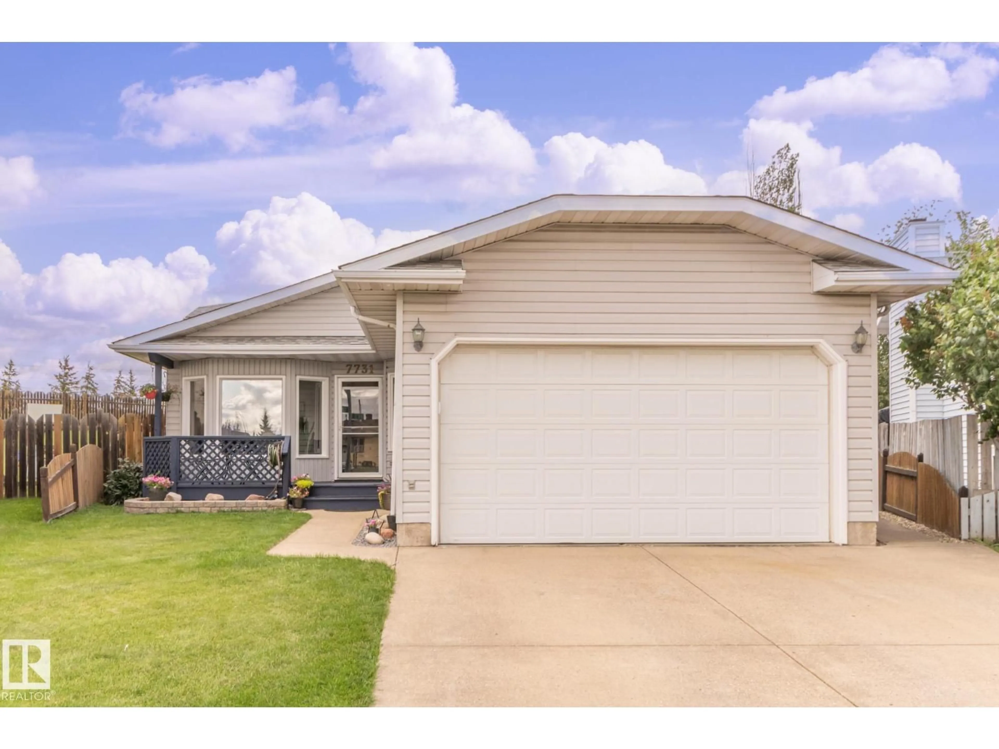 Home with vinyl exterior material, street for NW - 7731 188 ST, Edmonton Alberta T5T5J4