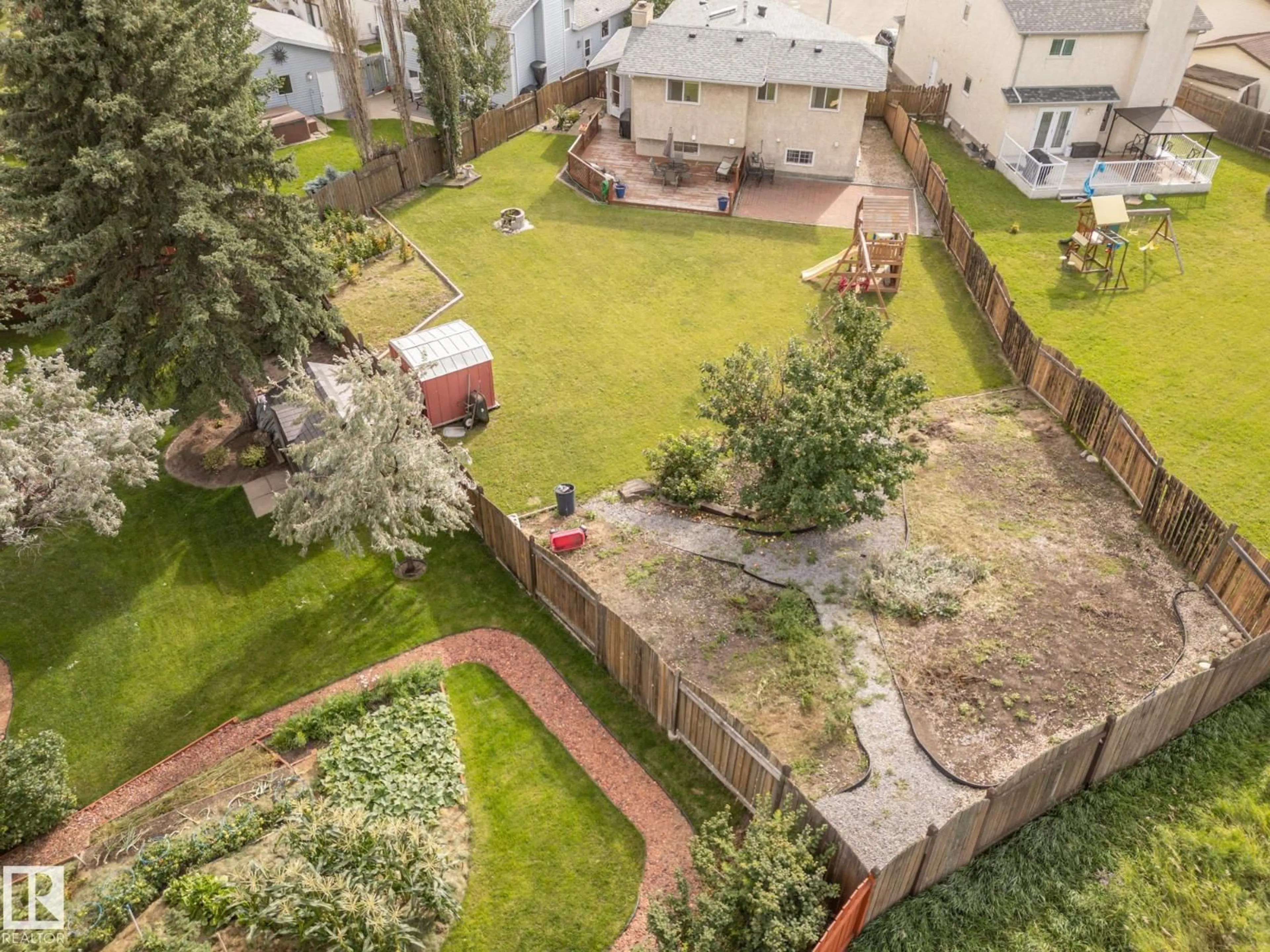 A pic from outside/outdoor area/front of a property/back of a property/a pic from drone, unknown for NW - 7731 188 ST, Edmonton Alberta T5T5J4