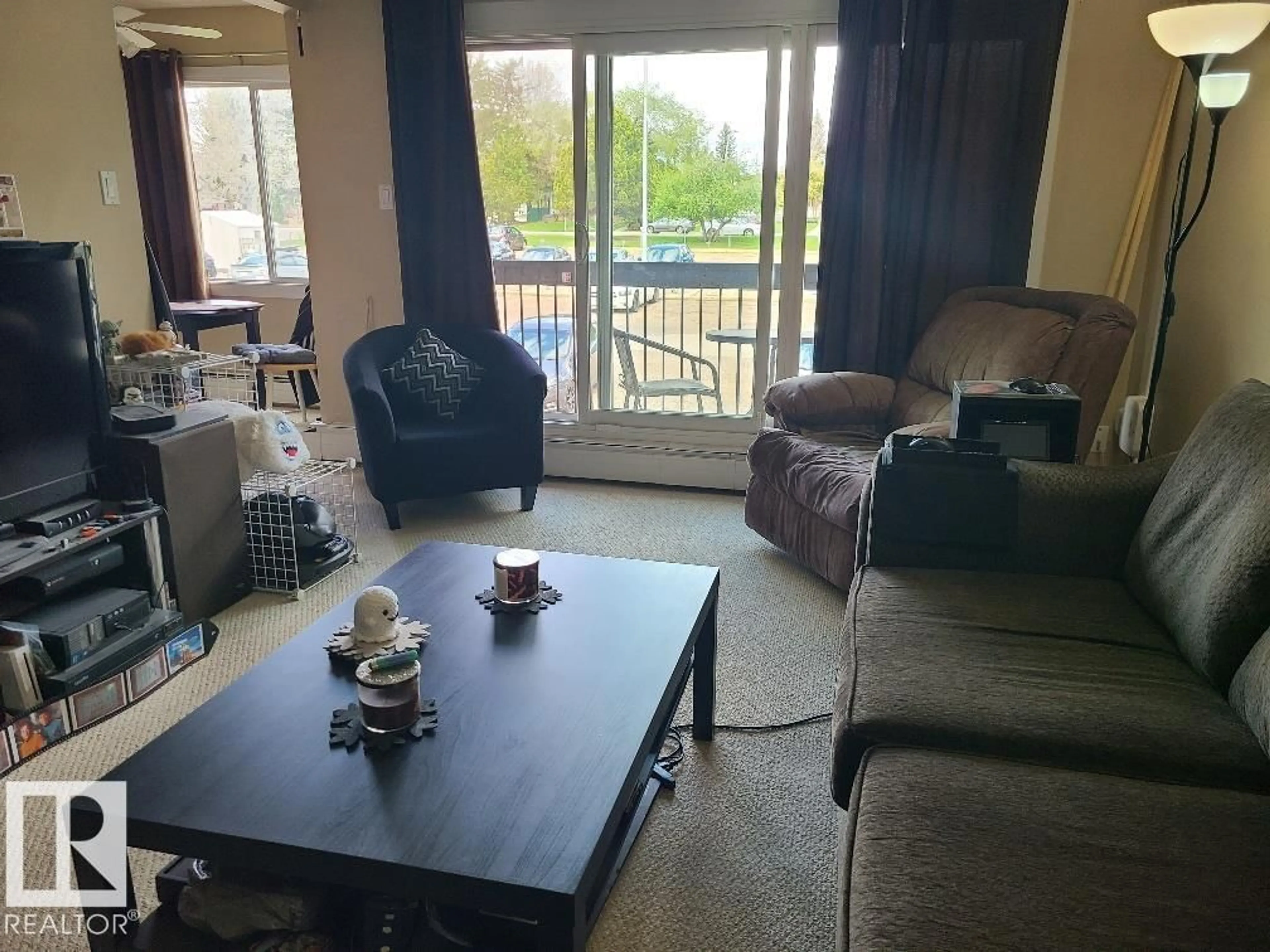 Living room with furniture, unknown for 11465 - 207 41 AV, Edmonton Alberta T6J0T9