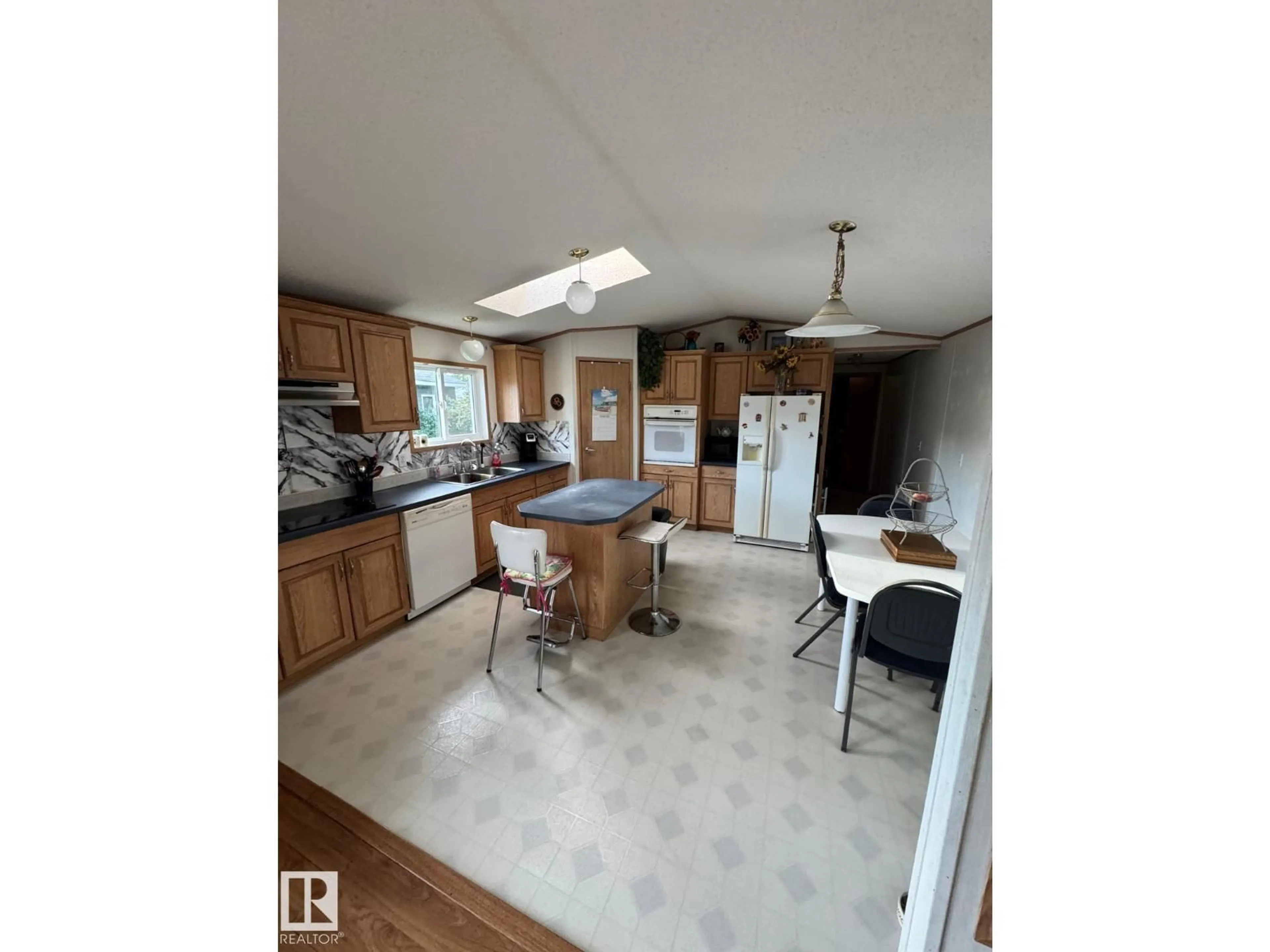 Open concept kitchen, ceramic/tile floor for NW NW - 388 EVERGREEN PA, Edmonton Alberta T5Y4M2