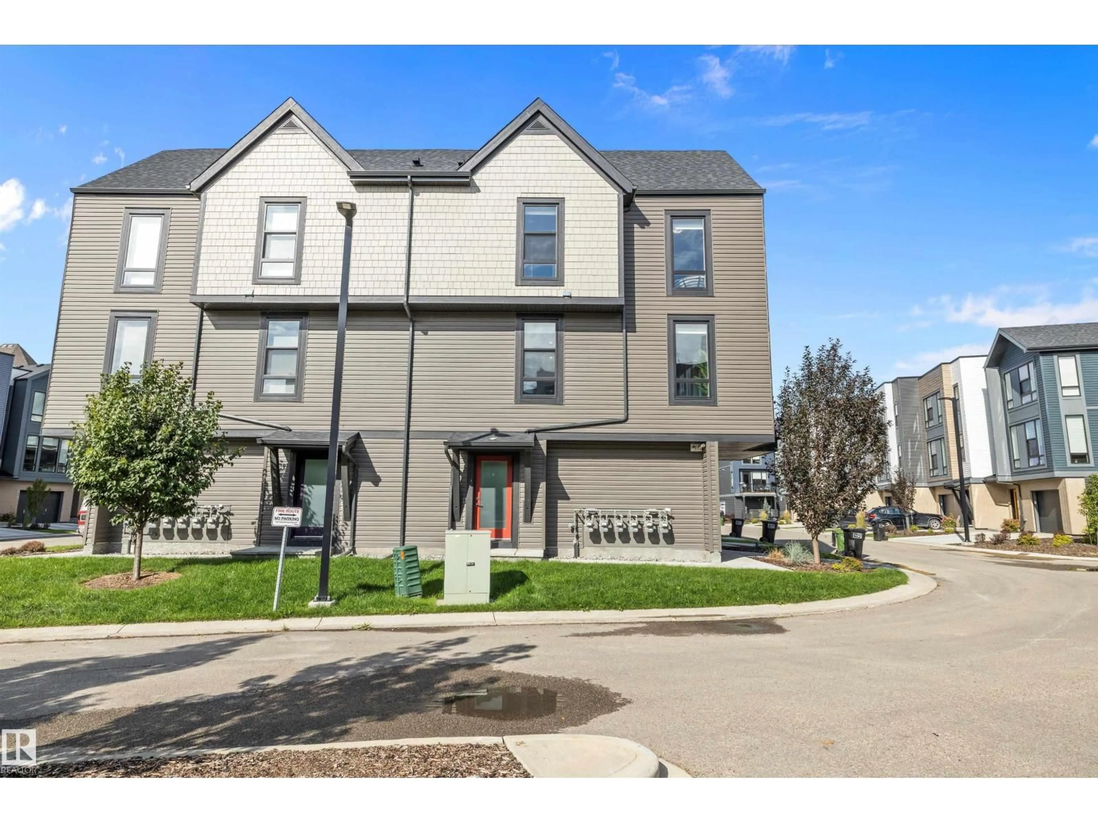 A pic from outside/outdoor area/front of a property/back of a property/a pic from drone, street for #106 - 1304 RUTHERFORD RD, Edmonton Alberta T6W0B4