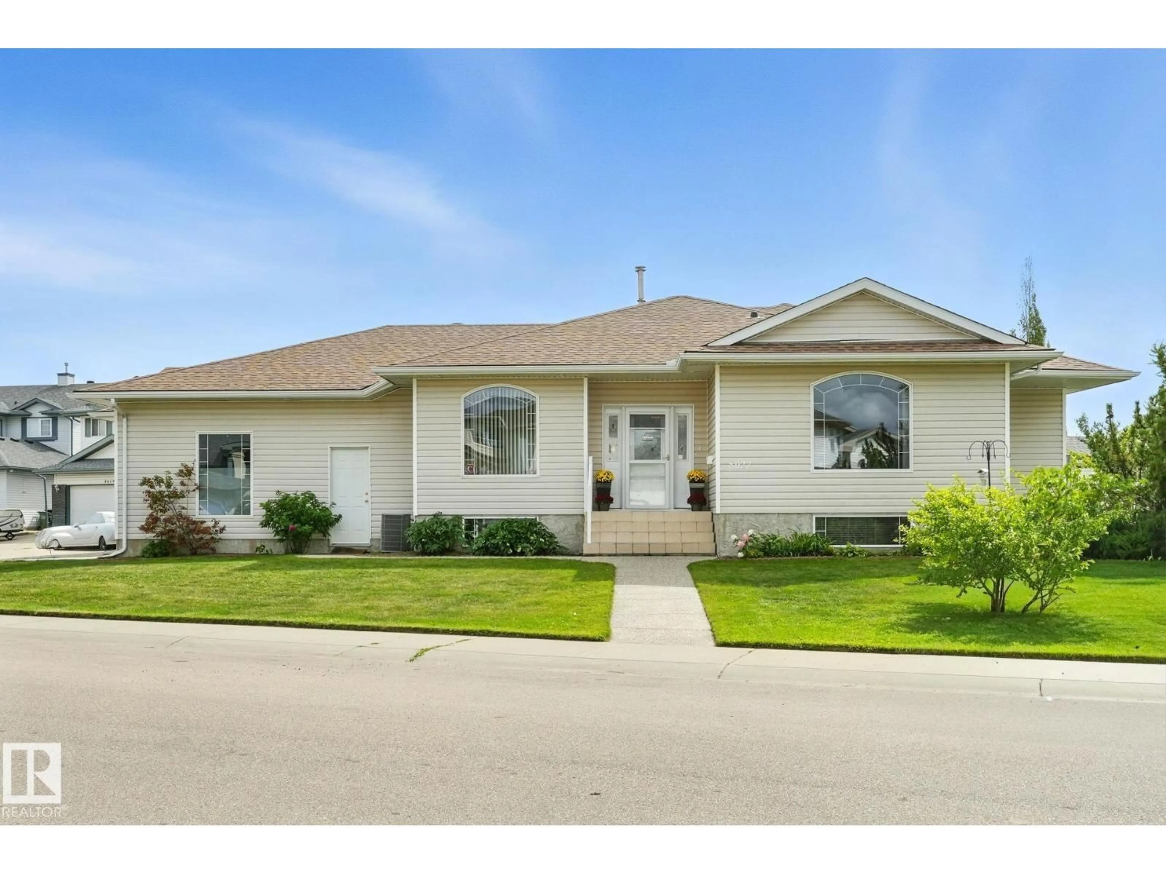 Home with vinyl exterior material, street for 8027 161A AV, Edmonton Alberta T5Z3G1