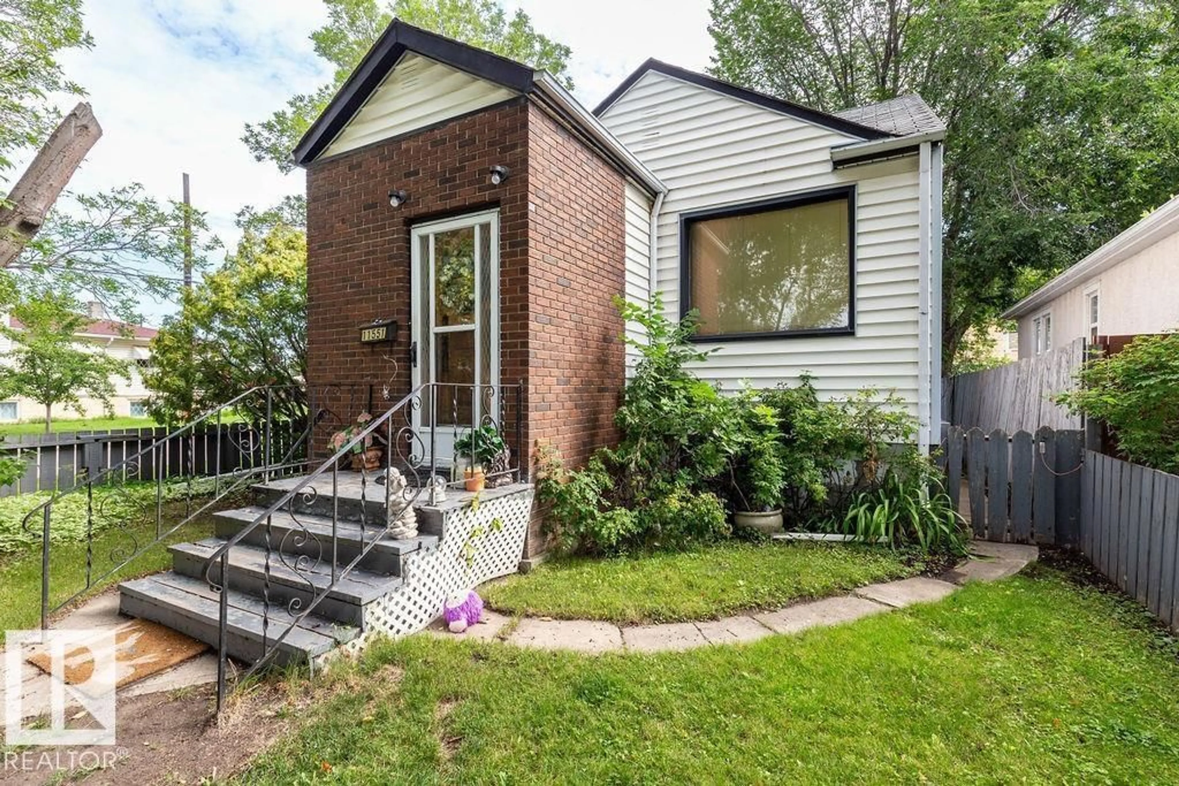 Home with brick exterior material, street for NW - 11551 68 ST, Edmonton Alberta T5B1P2