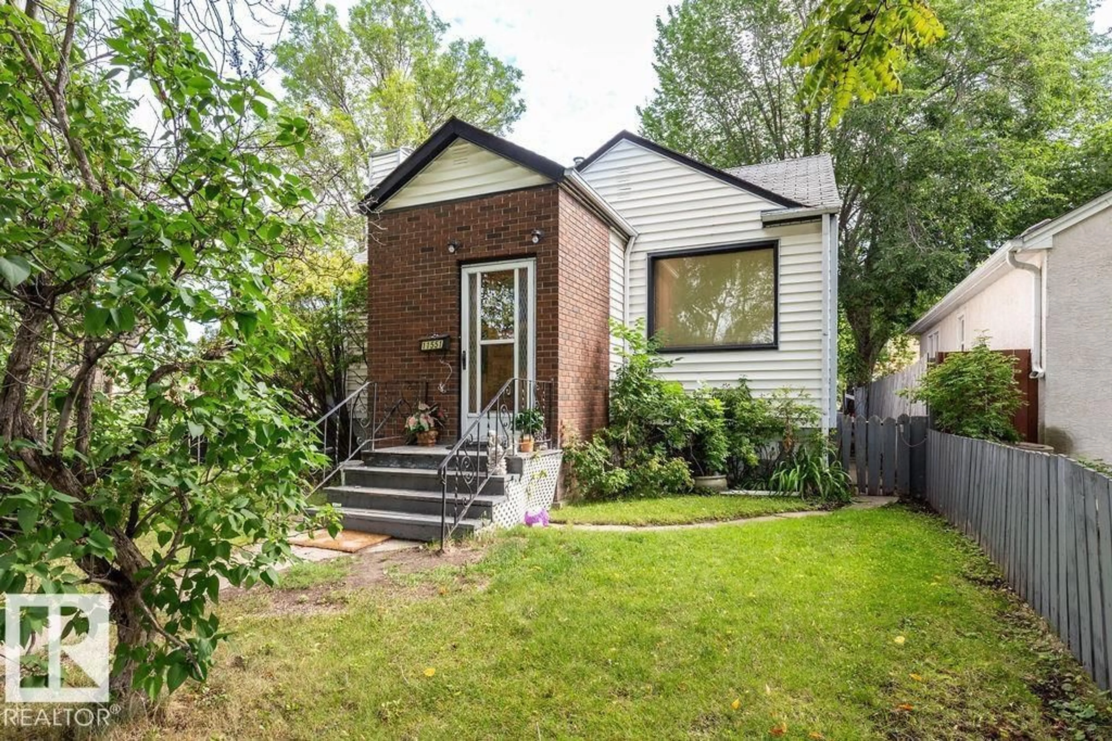 Home with brick exterior material, street for NW - 11551 68 ST, Edmonton Alberta T5B1P2