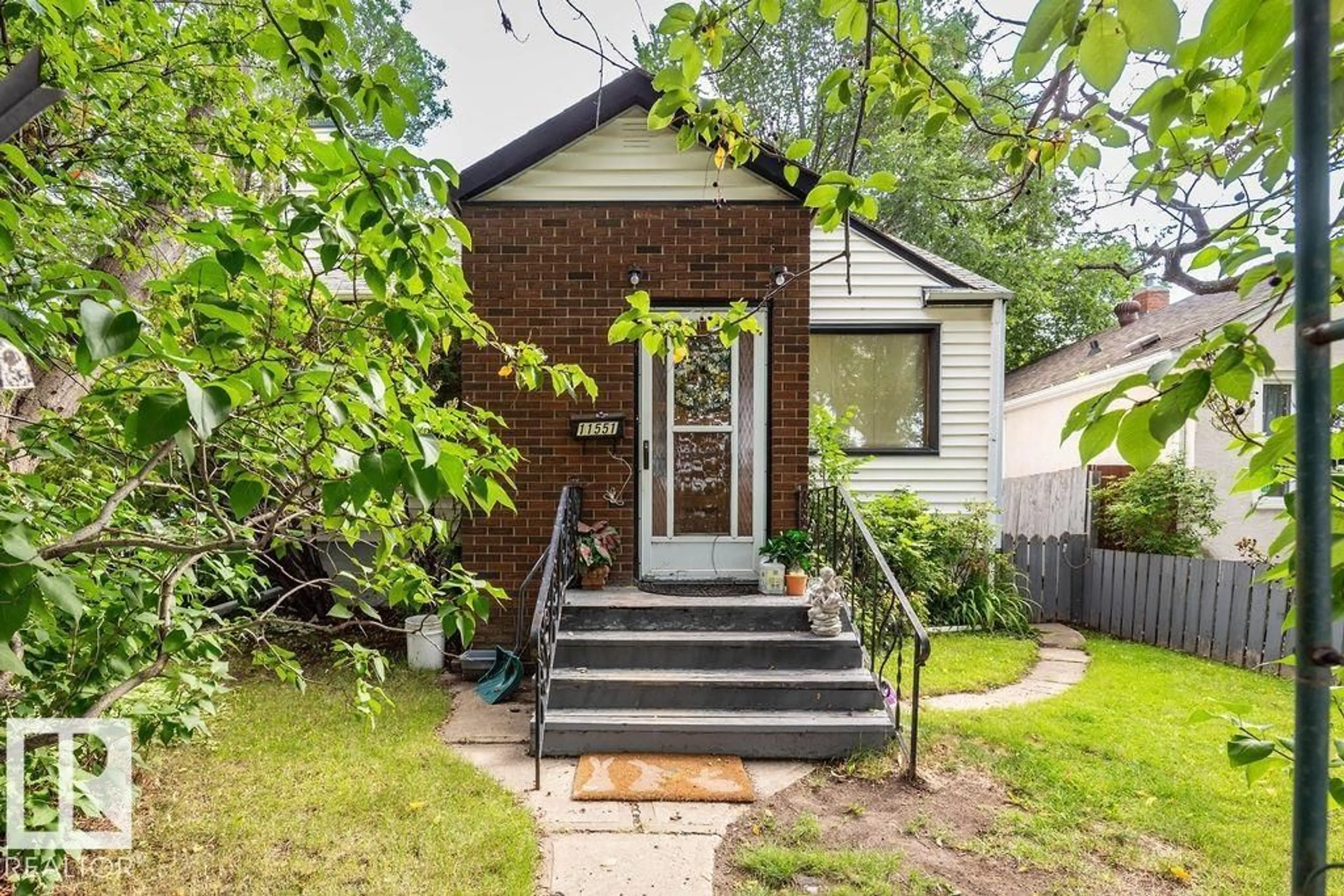 Home with brick exterior material, street for NW - 11551 68 ST, Edmonton Alberta T5B1P2