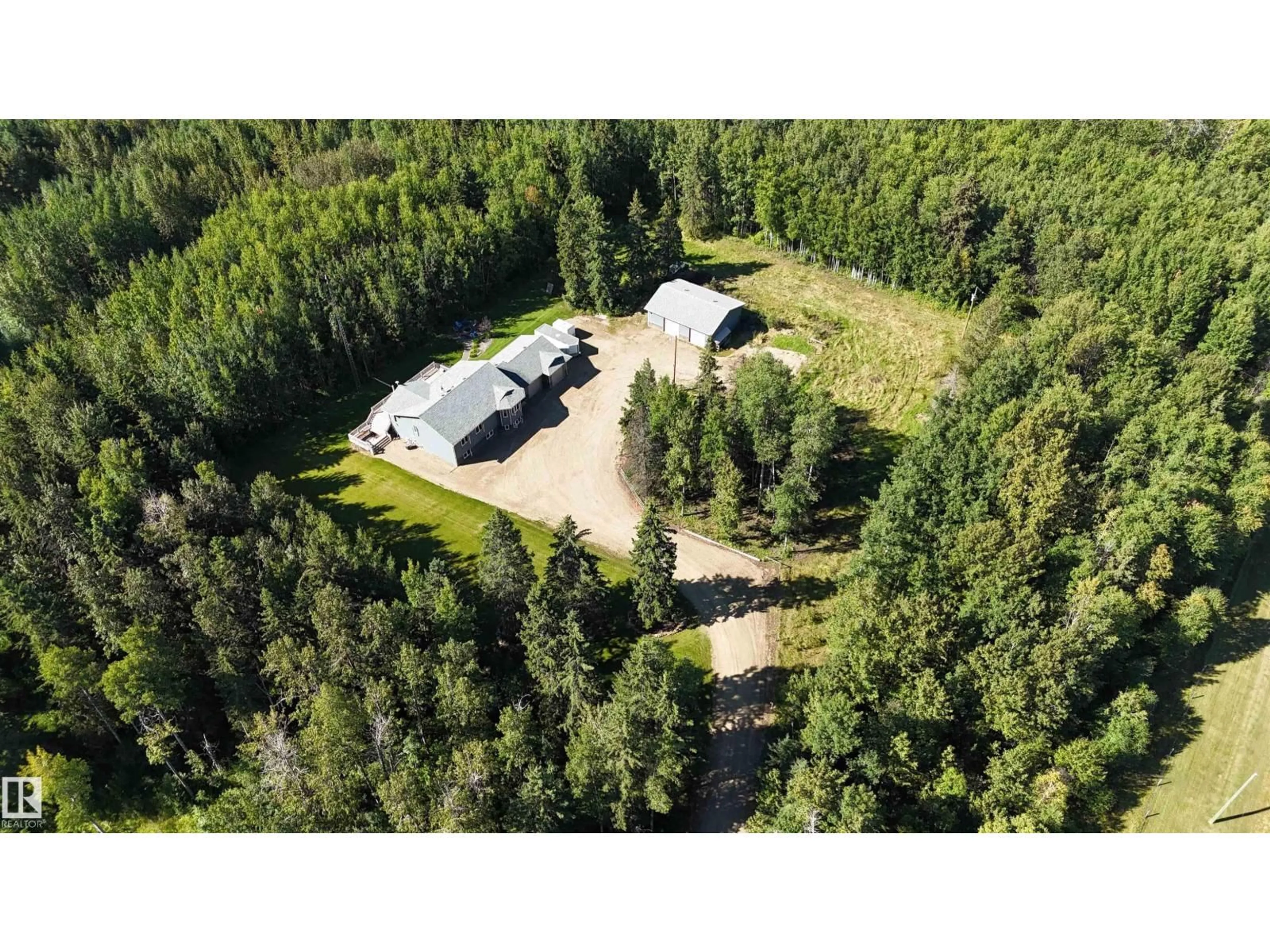 A pic from outside/outdoor area/front of a property/back of a property/a pic from drone, forest/trees view for 482 - 8125 B TWP RD, Rural Brazeau County Alberta T7A2A1