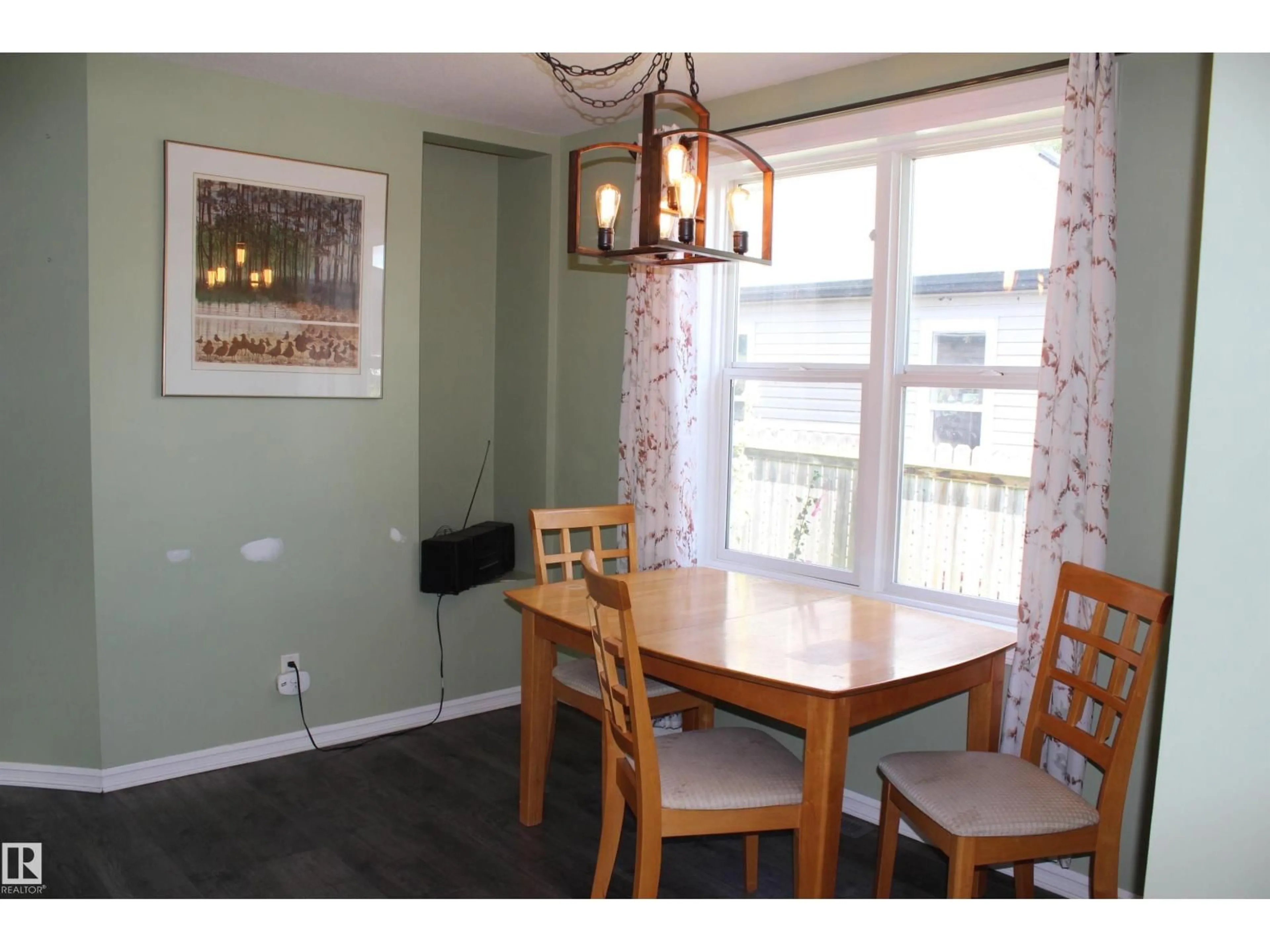 Dining room, wood/laminate floor for 5023 53 AV, Mundare Alberta T0B3H0