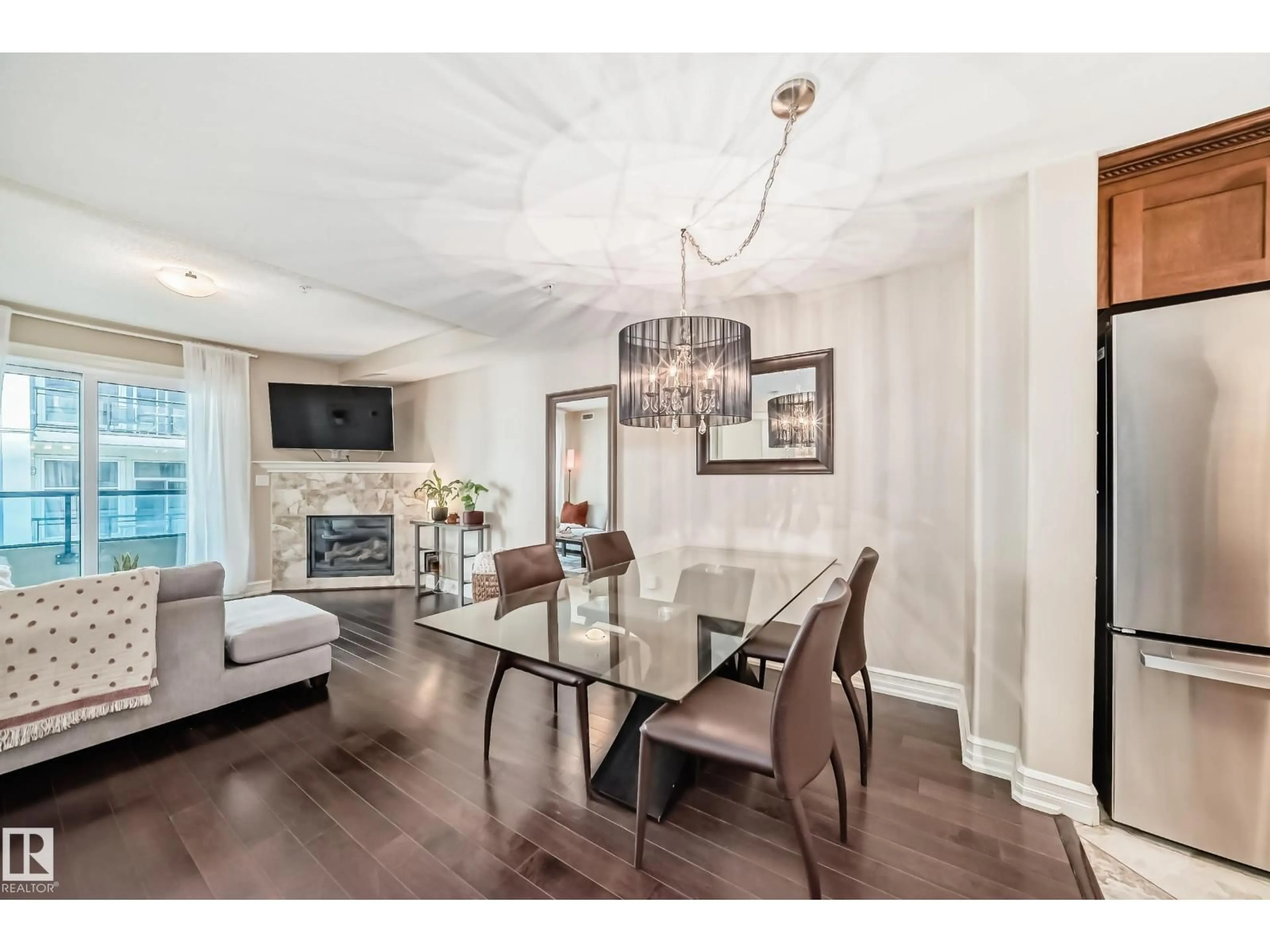 Dining room, wood/laminate floor for 225 10142 111 ST NW, Edmonton Alberta T5K1K6