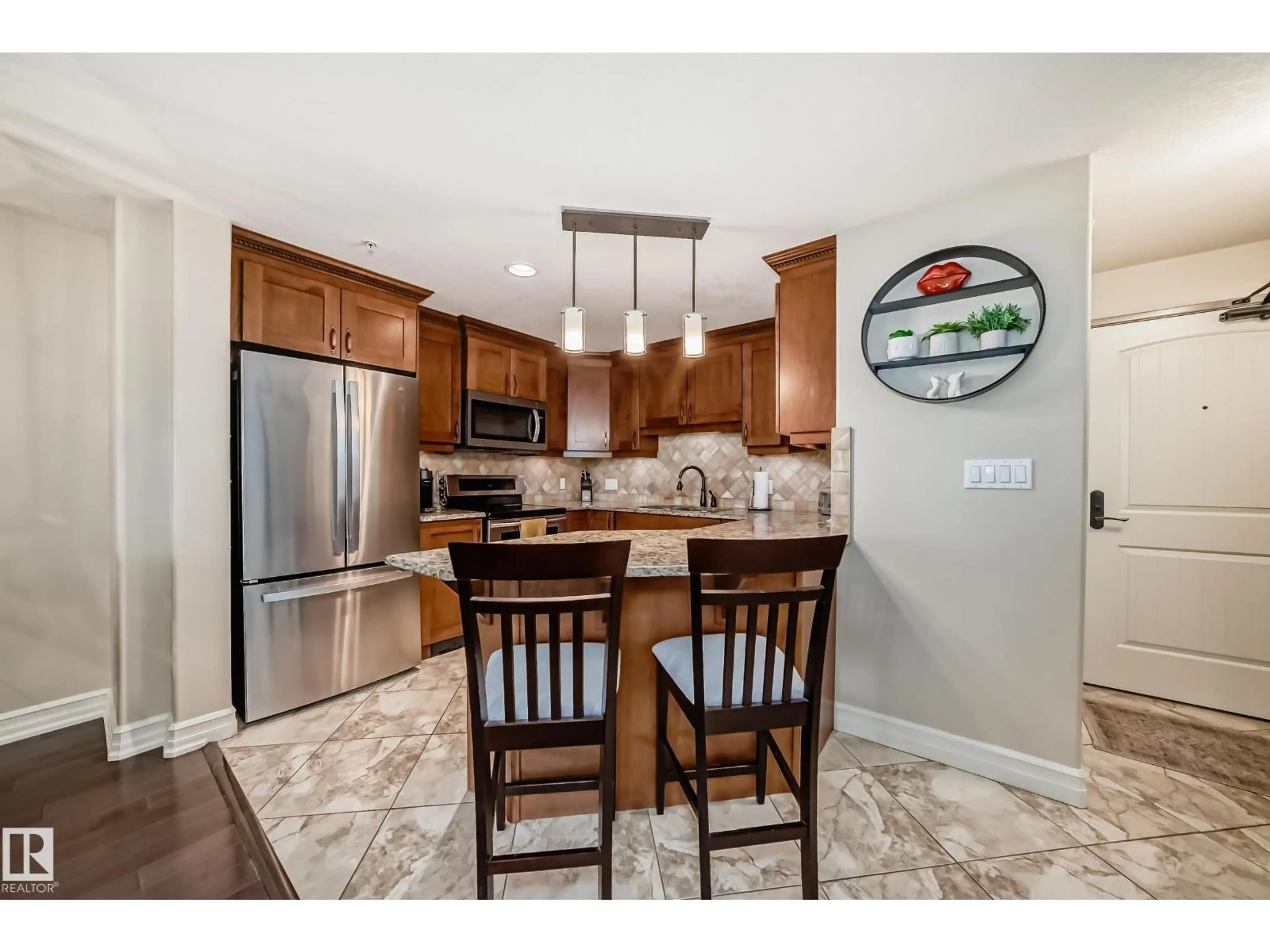 Open concept kitchen, ceramic/tile floor for 225 10142 111 ST NW, Edmonton Alberta T5K1K6
