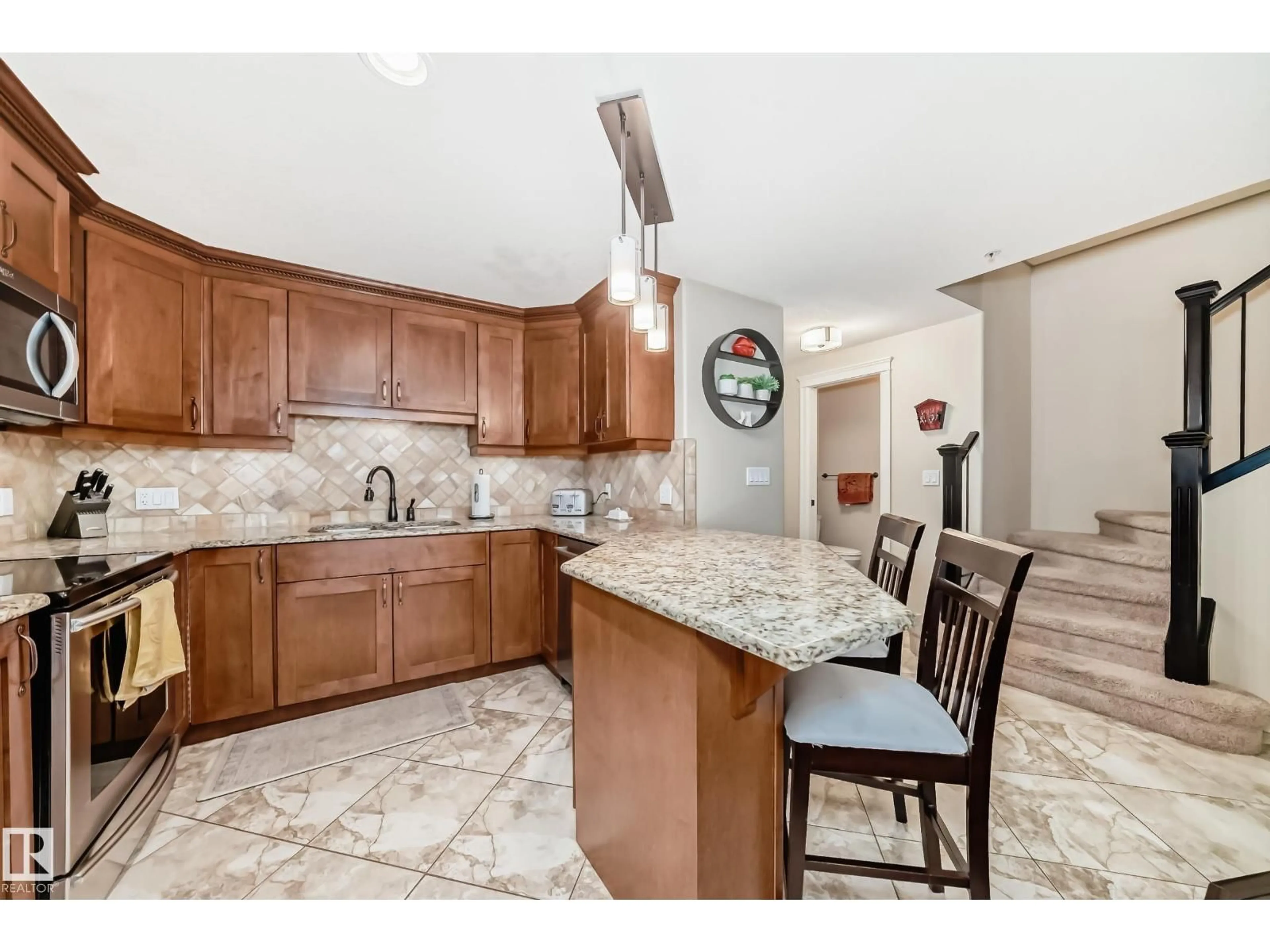 Open concept kitchen, ceramic/tile floor for 225 10142 111 ST NW, Edmonton Alberta T5K1K6